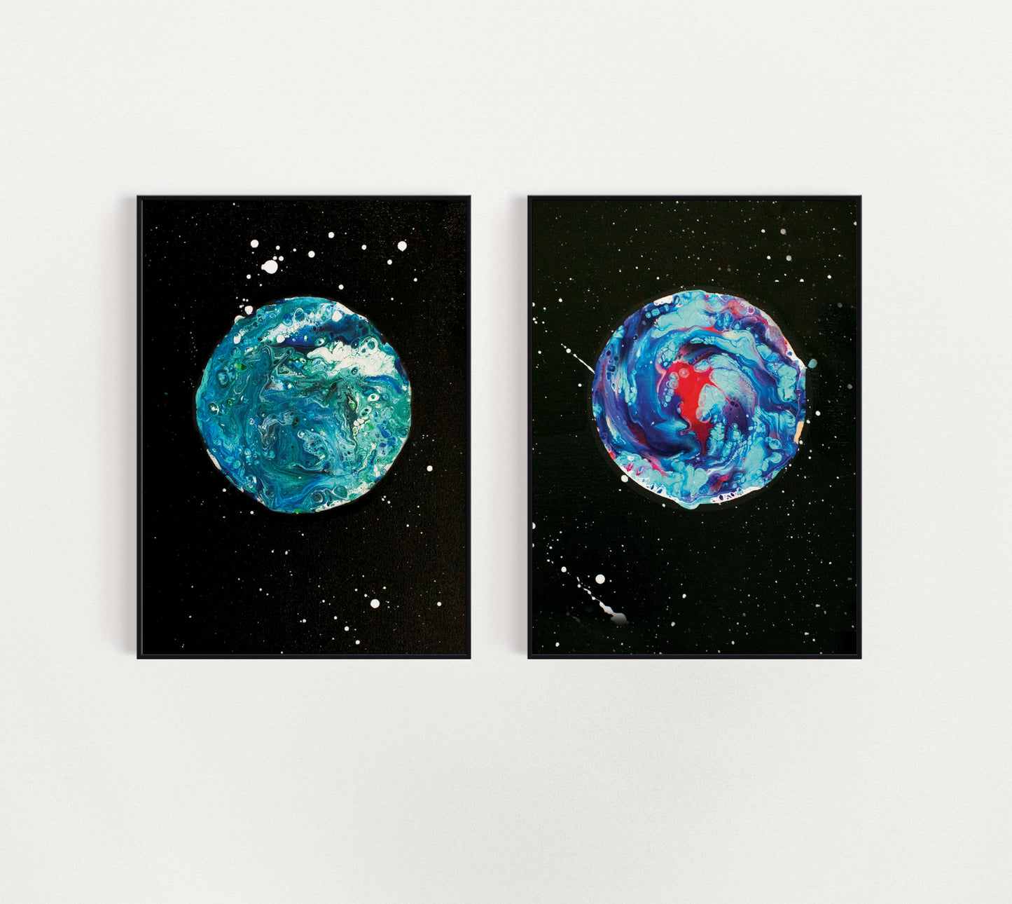 Blue Moon and Her Majesty The Moon acrylic fluid art prints side by side on a clean white wall, shown unframed to highlight their vibrant abstract celestial designs.