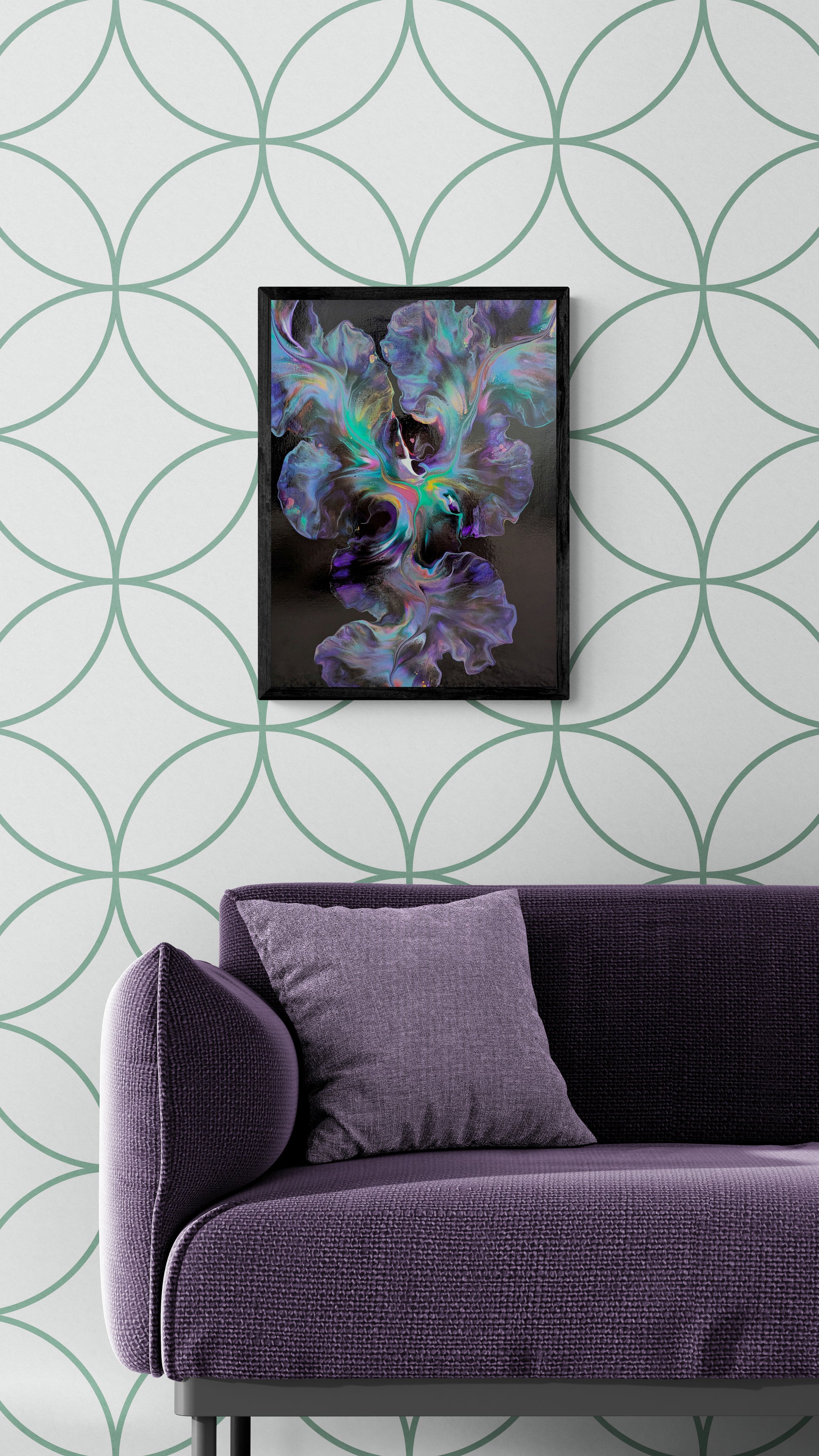 A vibrant abstract painting titled "Celestial Dance" is framed in black and displayed on a white wall with a repeating green circular pattern. The artwork features swirling forms in shades of teal, purple, and soft iridescent tones over a black background. Below, a modern violet sofa with a lavender pillow anchors the space, creating a luxe, cosmically-inspired living room scene.