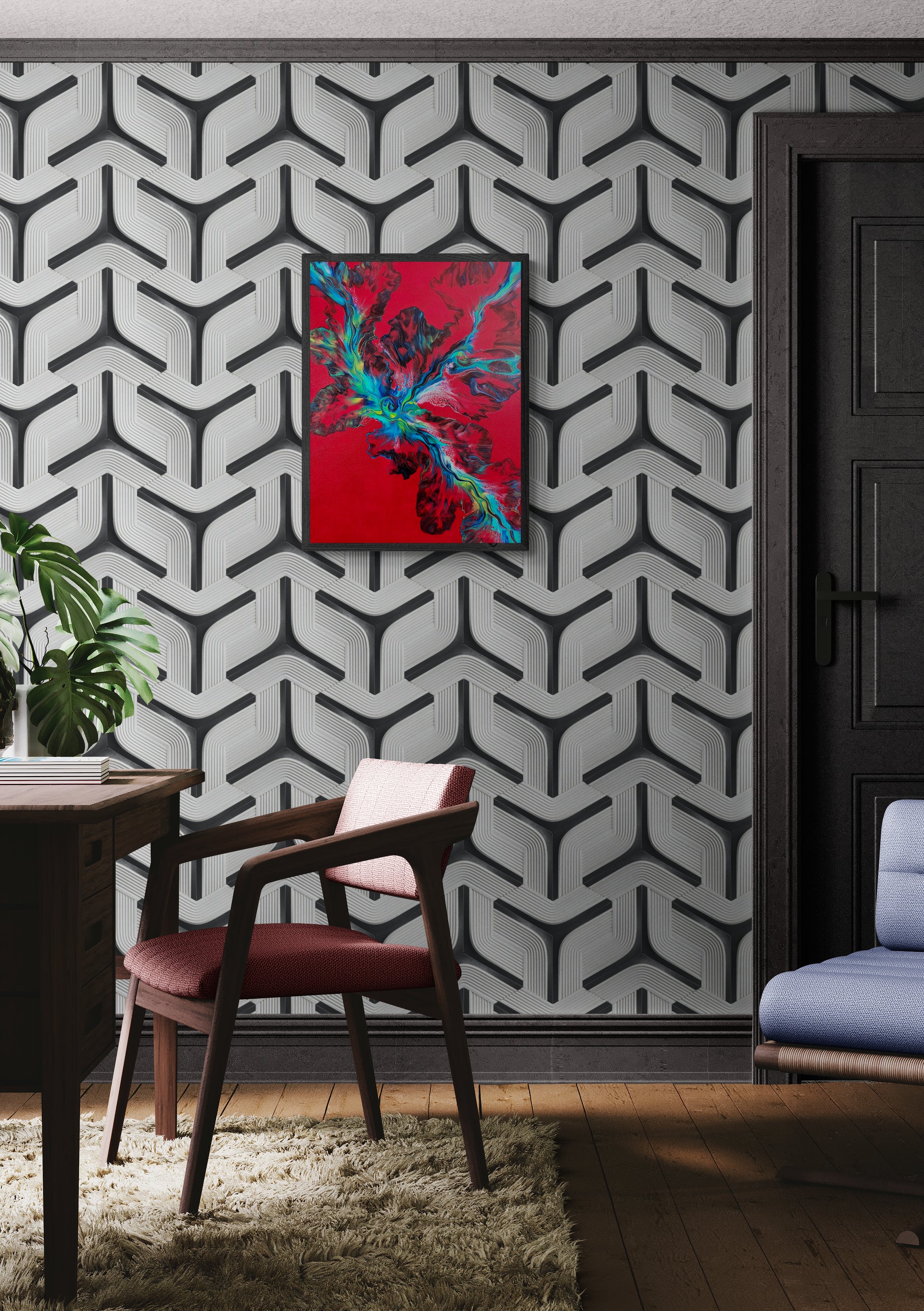 The painting "Elemental Surge" hangs in a mid-century styled room with bold black and gray geometric wallpaper. The vivid red, teal, and black abstract artwork is framed above a dusty red chair, next to a wooden desk and shaggy beige rug.