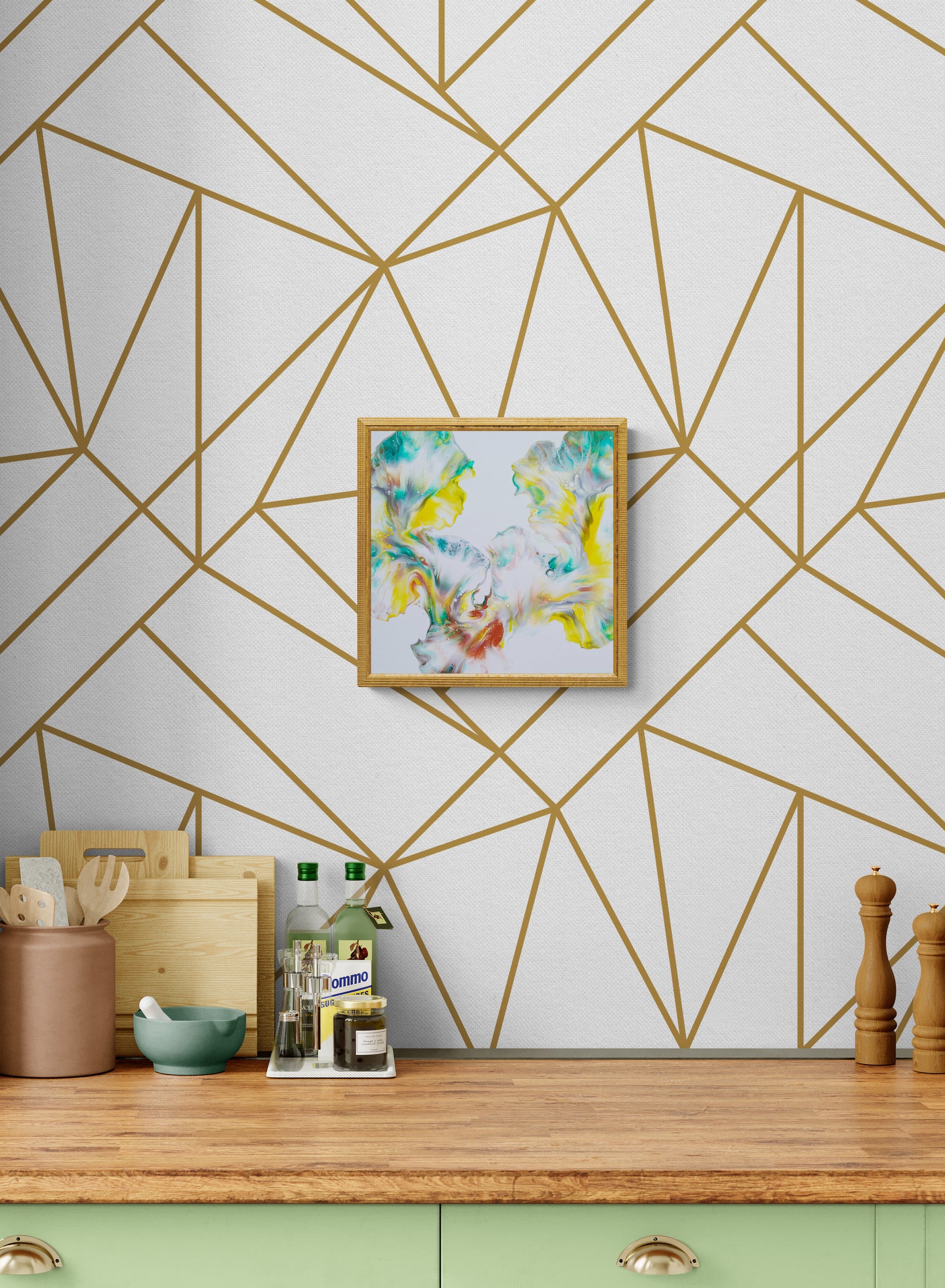 First Daffodils of Spring fluid art painting framed in light wood, styled above a kitchen counter with geometric gold wall design.