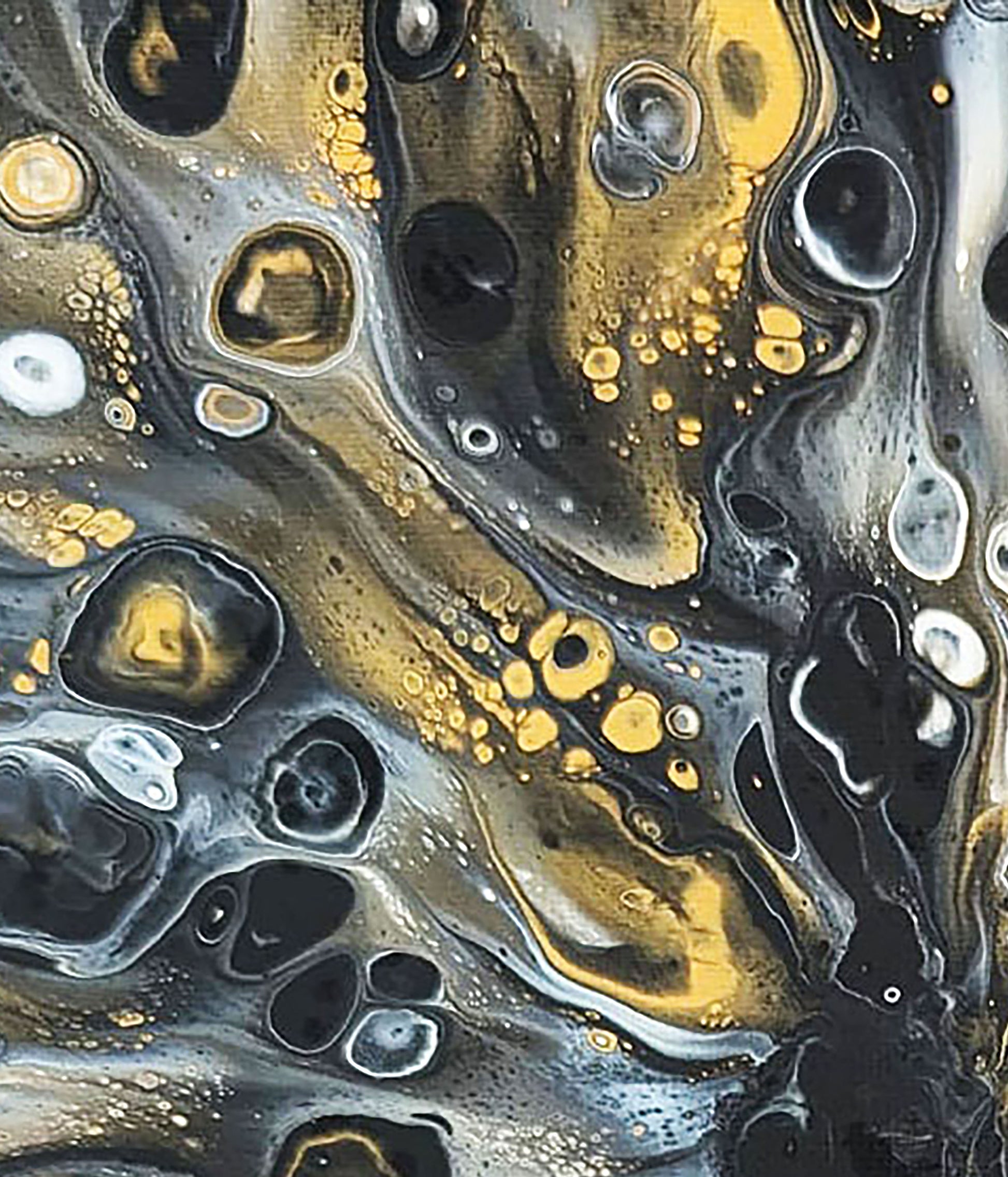 Macro view of “Glamorous,” revealing layered streams of black, white, and shimmering gold flowing together. Intricate bubbles and ripples capture the essence of molten metal and liquid motion.