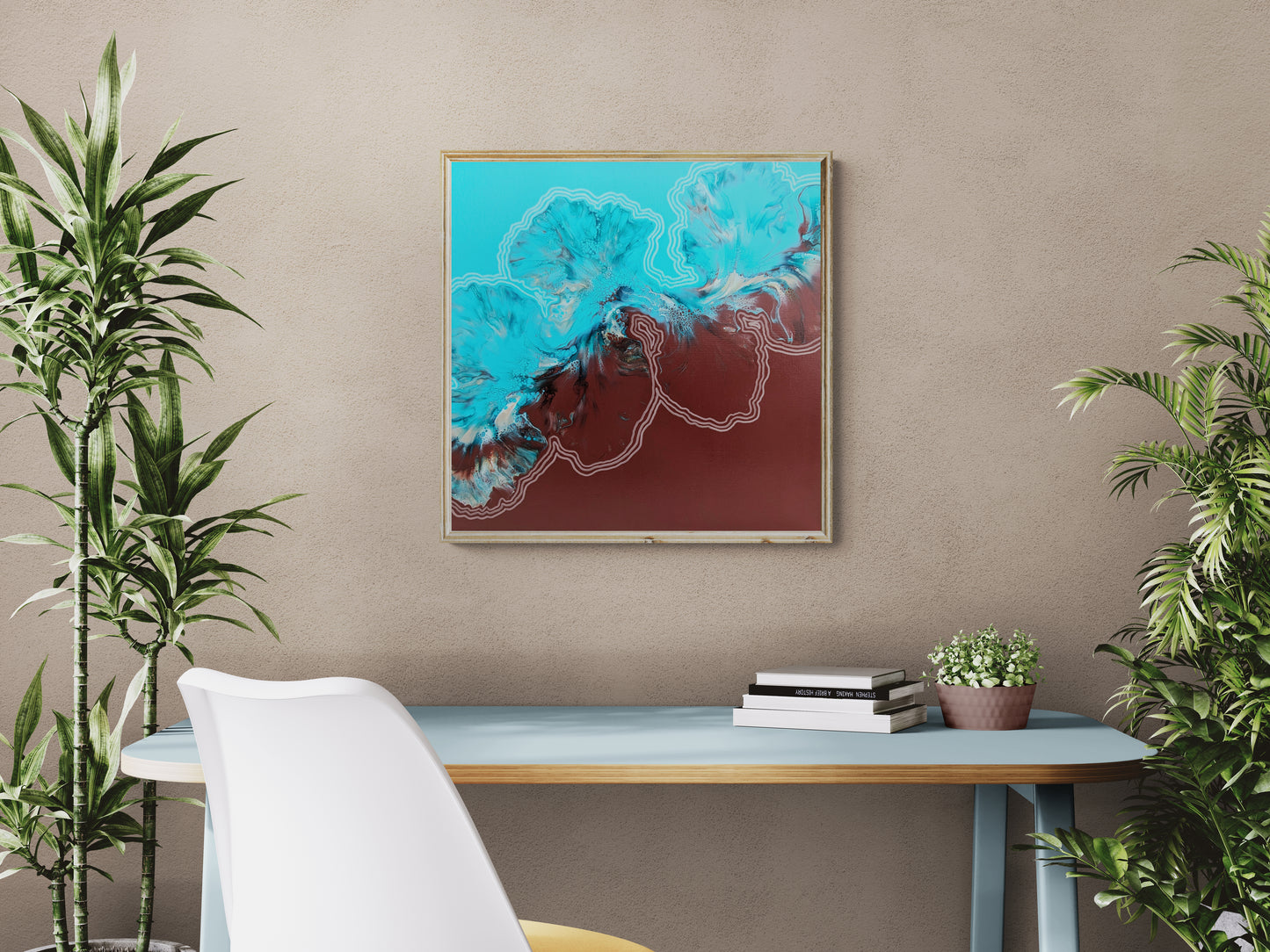 Growth & Change painting hanging above a light blue desk with plants and books, styled in a bright modern home office.