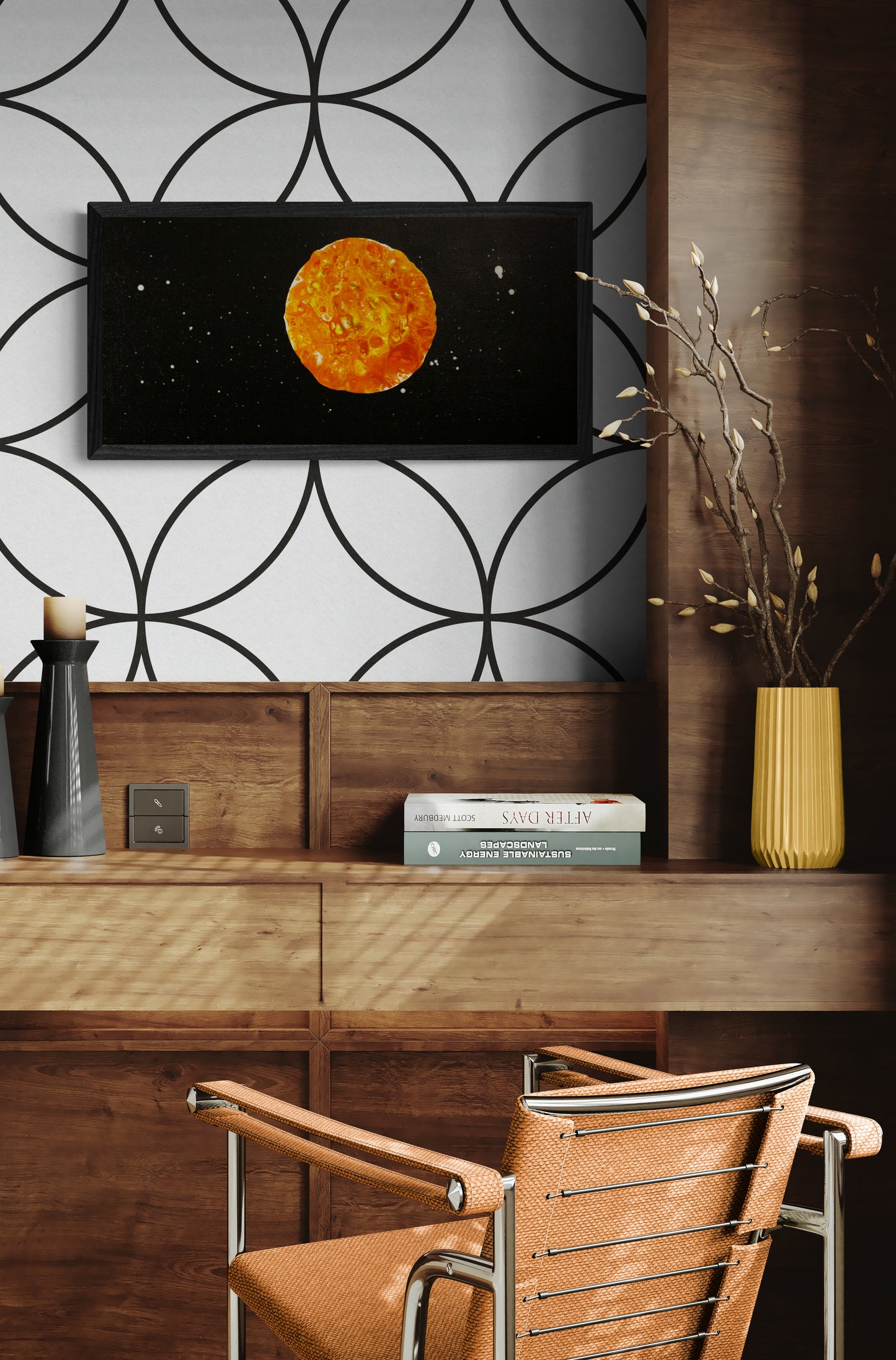 Framed Harvest Moon acrylic fluid painting displayed on a patterned wall above a wooden desk with modern decor accents.
