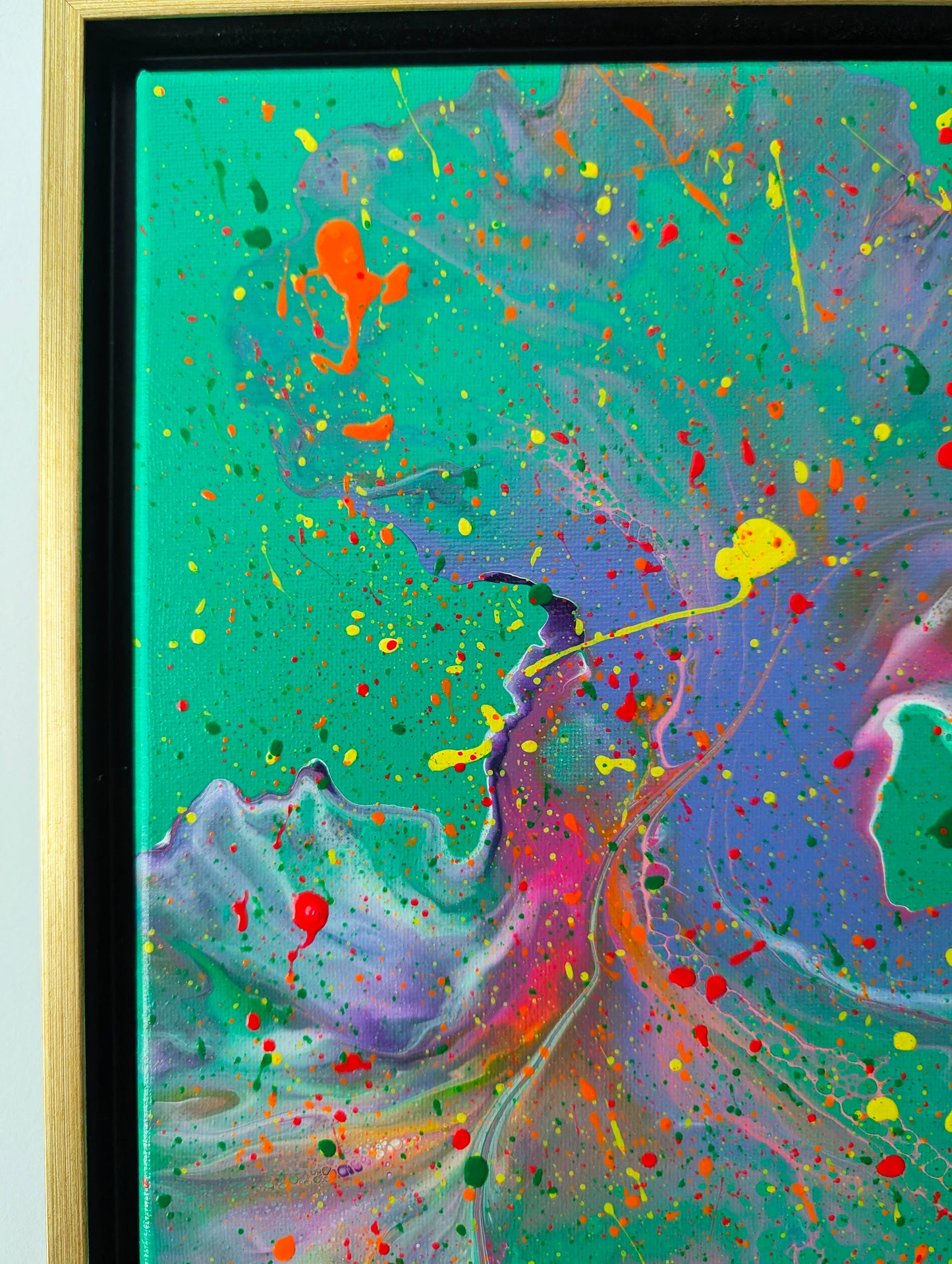 Close-up of the top left section of 'Have You Lost Weight?', capturing bold neon orange, yellow, and red splatter atop rich purple, green, and teal fluid patterns.