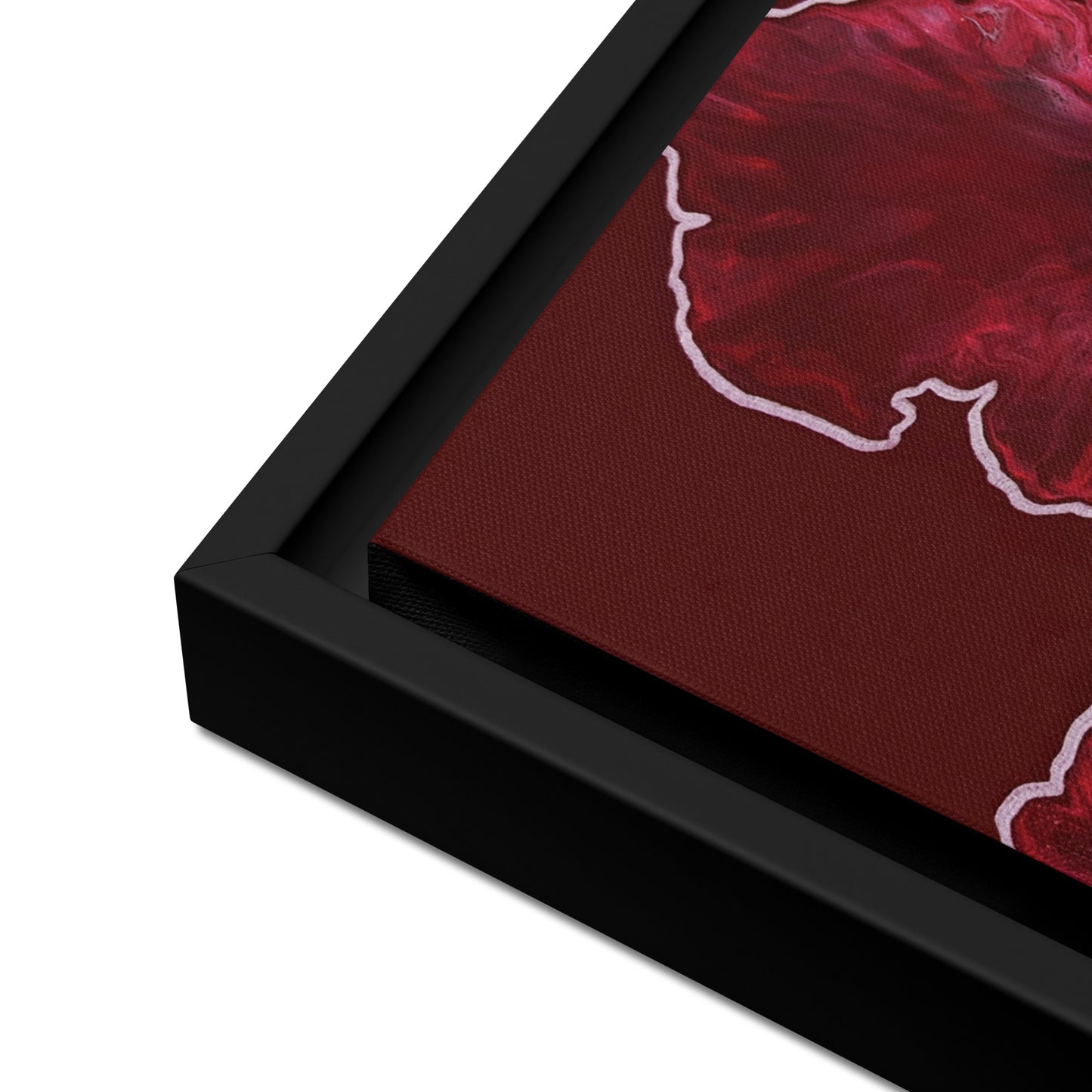 Close-up of "Hold The Line" acrylic fluid art canvas print in a black floating frame, showing the textured red and pink abstract details and corner frame join.