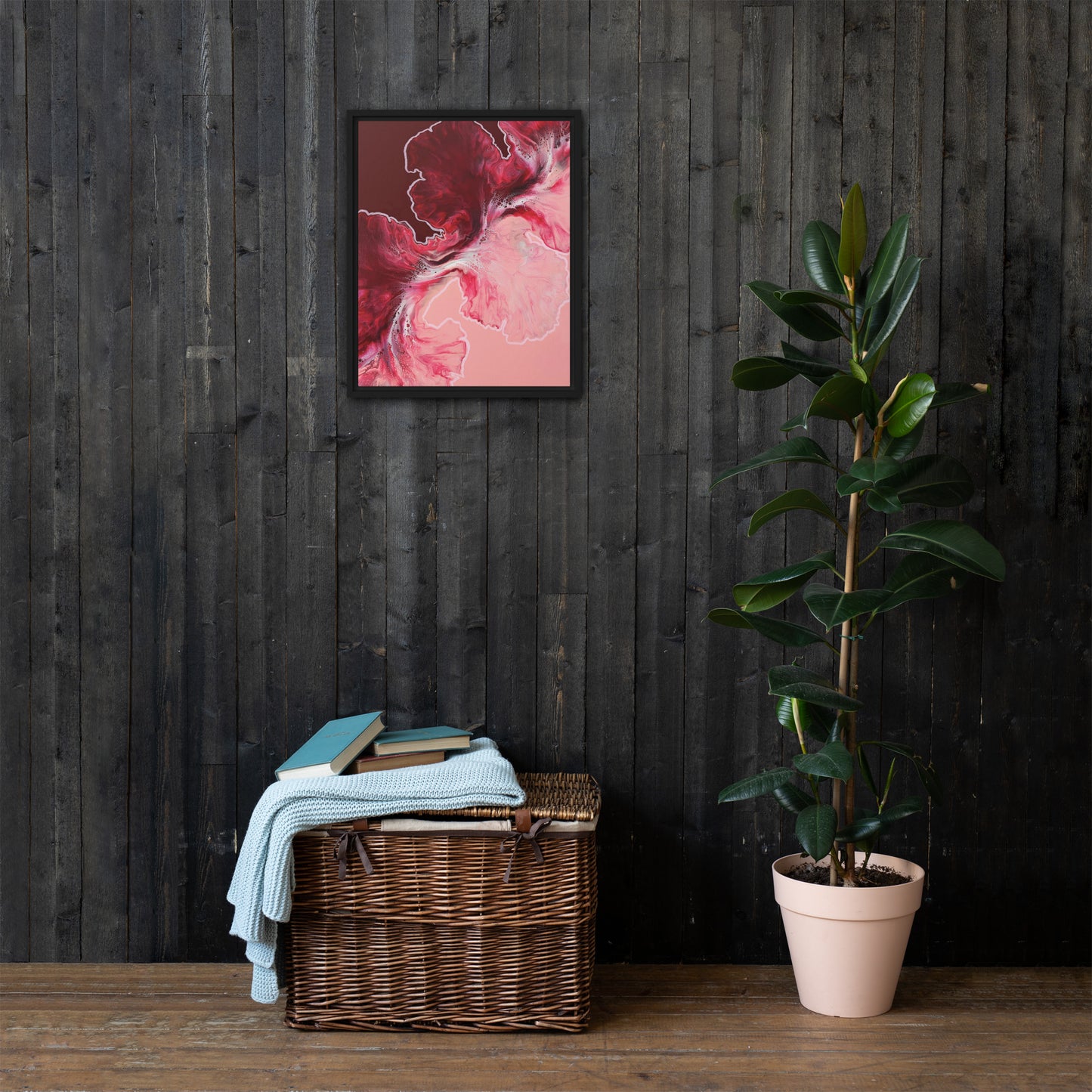 "Hold The Line" acrylic fluid art canvas print in a black floating frame, displayed on a dark wood wall above a wicker basket and plant.