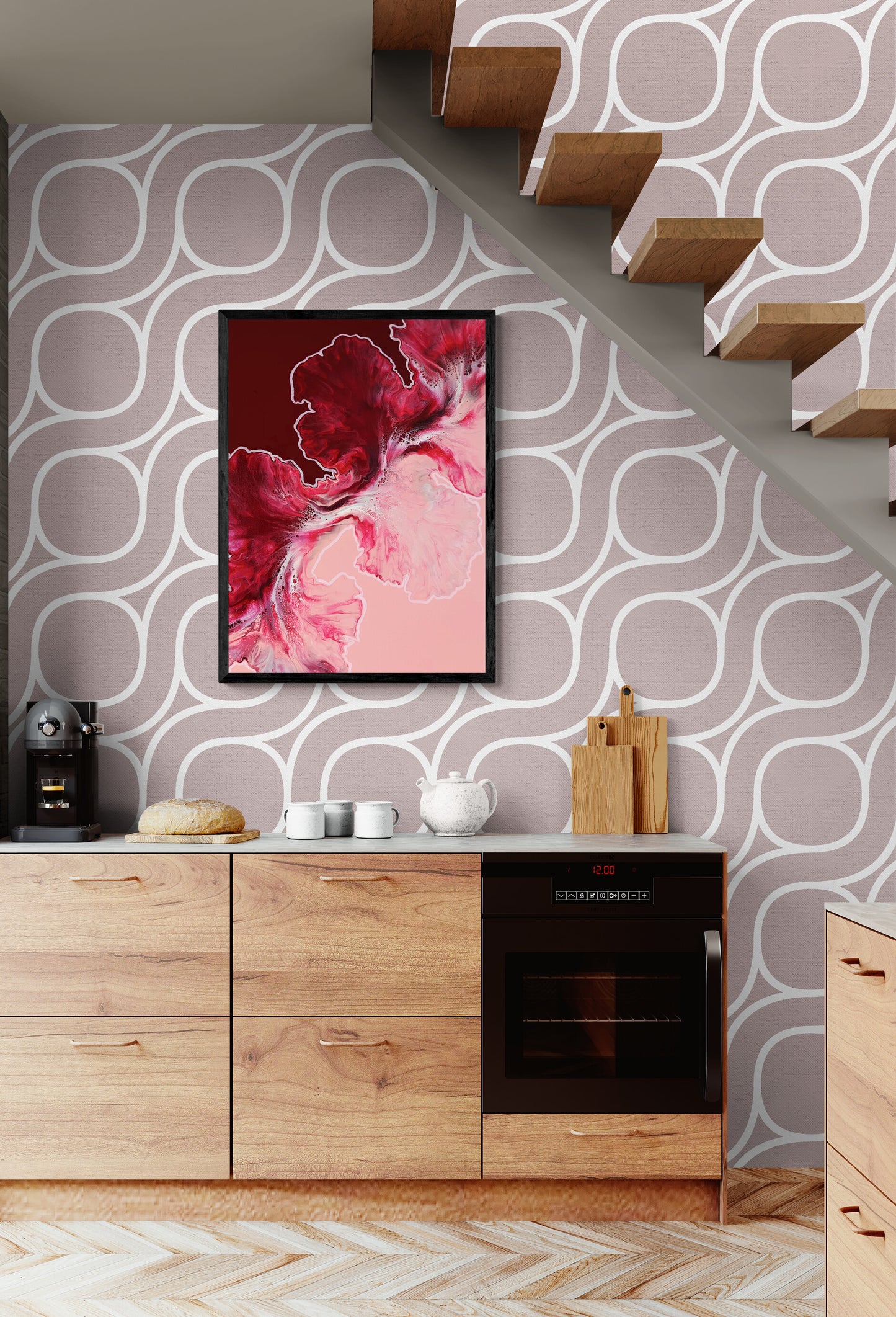 “Hold the Line,” a red and pink abstract fluid art canvas print, hangs beneath a staircase in a cozy modern kitchen with natural wood cabinets and graphic wallpaper. The artwork’s vibrant flow adds movement and sophistication to the everyday space.