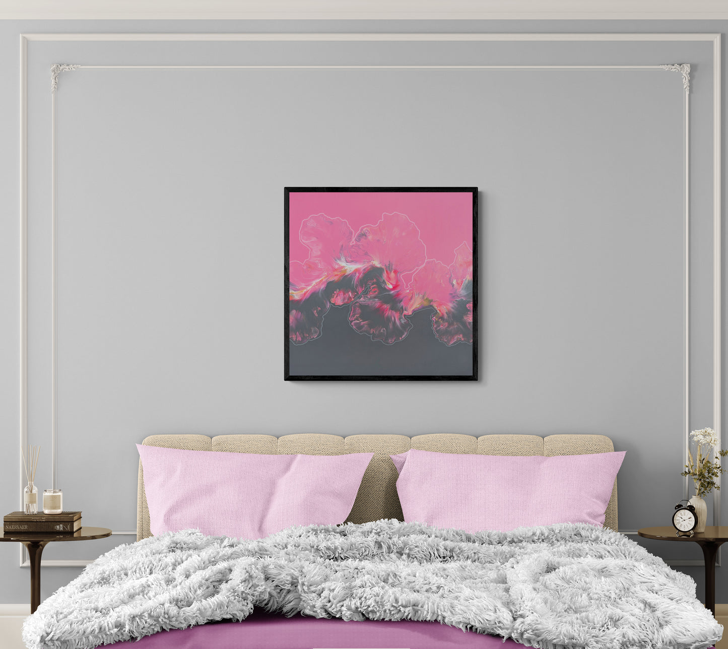 Abstract painting titled “In My Bliss” with pink and charcoal tones, hanging above a beige headboard in a modern bedroom with lavender pillows and a fluffy gray blanket.