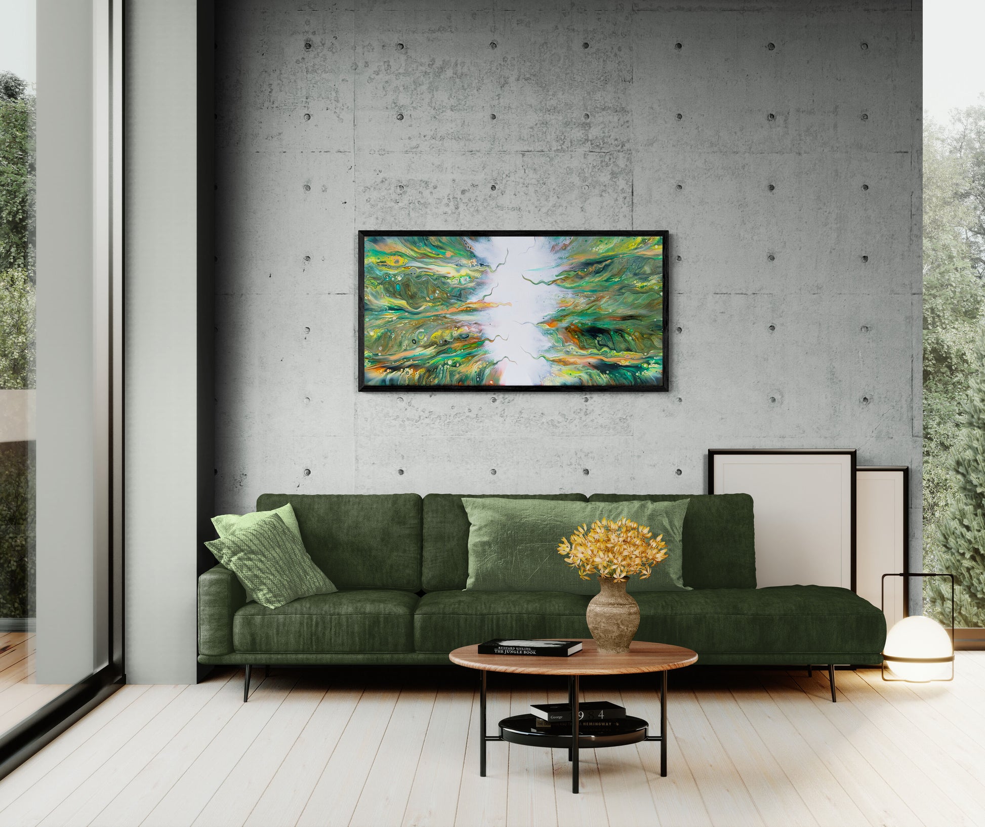A modern living room with a concrete wall and large windows features the abstract canvas print “Lush” above a deep green sofa. The artwork’s vivid greens, yellows, and whites mirror the room’s natural tones, creating a vibrant focal point in the minimalist setting.