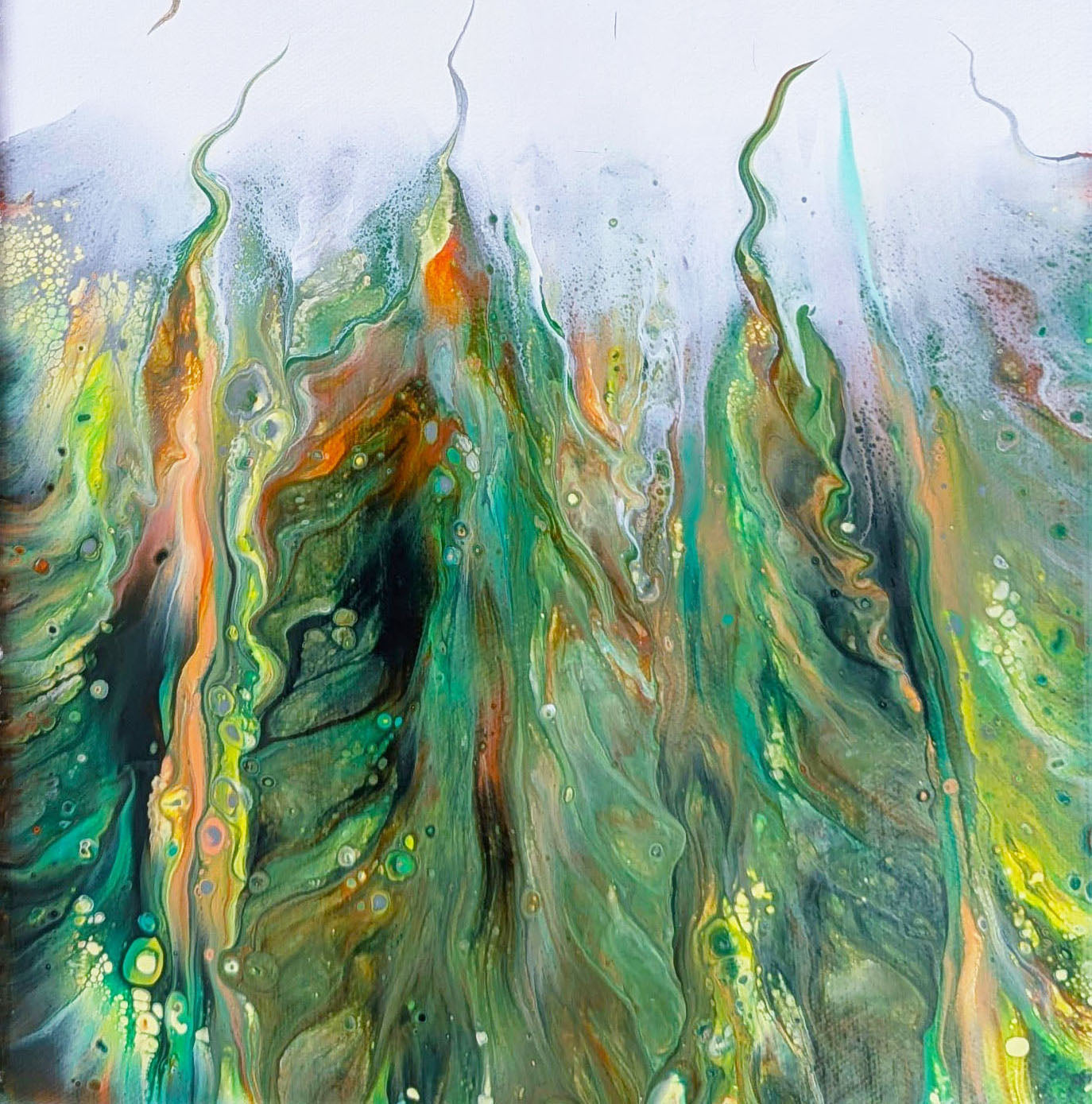 Macro shot of “Lush,” revealing swirling patterns of emerald, gold, and turquoise with soft transitions into white. The fine cell details and color veining evoke the feeling of lush foliage and sunlight breaking through dense growth.