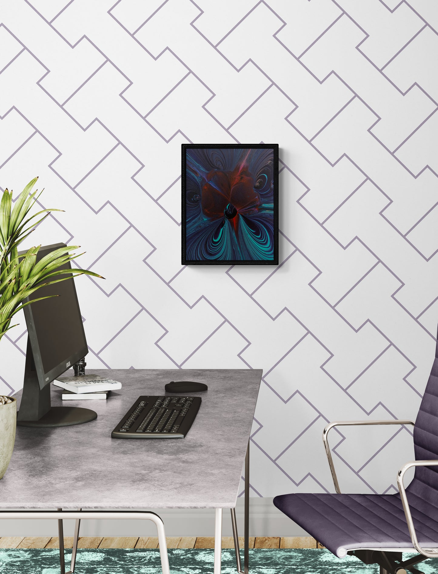 Framed abstract painting in dark teal, red, and black tones displayed above a modern concrete desk setup with a purple office chair, keyboard, monitor, and white geometric wallpaper.
