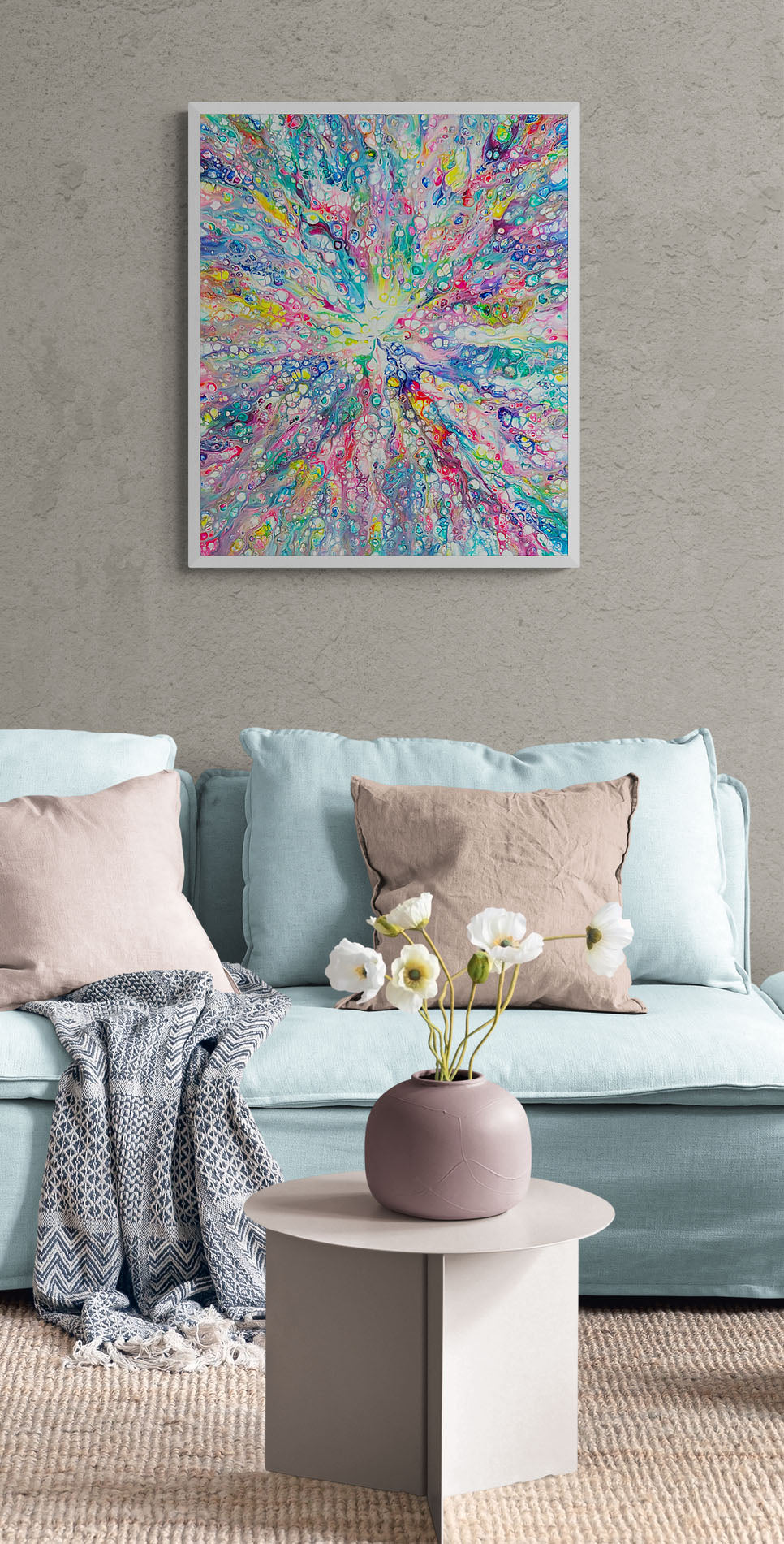 Rainbow Dragon fluid art painting framed in white, styled above a soft pastel couch with neutral and light blue decor.