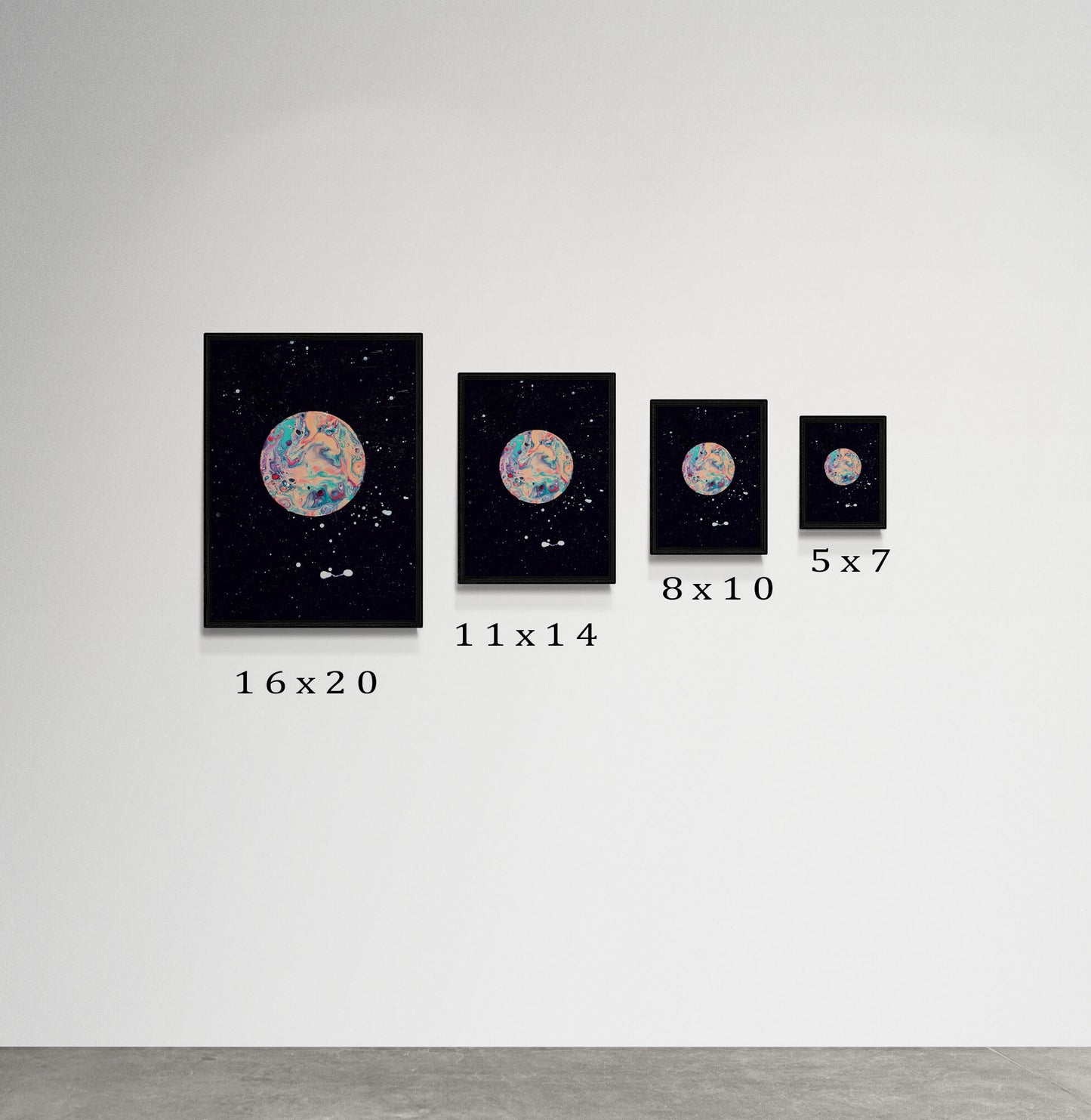 Side-by-side comparison of Abby May Art’s “Strawberry Moon” painting in four sizes—16x20, 11x14, 8x10, and 5x7—each in a black frame. The artwork shows a pink and pastel-colored swirling moon floating in a black starry space. The prints are arranged on a minimalist white wall, with size labels below each frame to demonstrate scale.