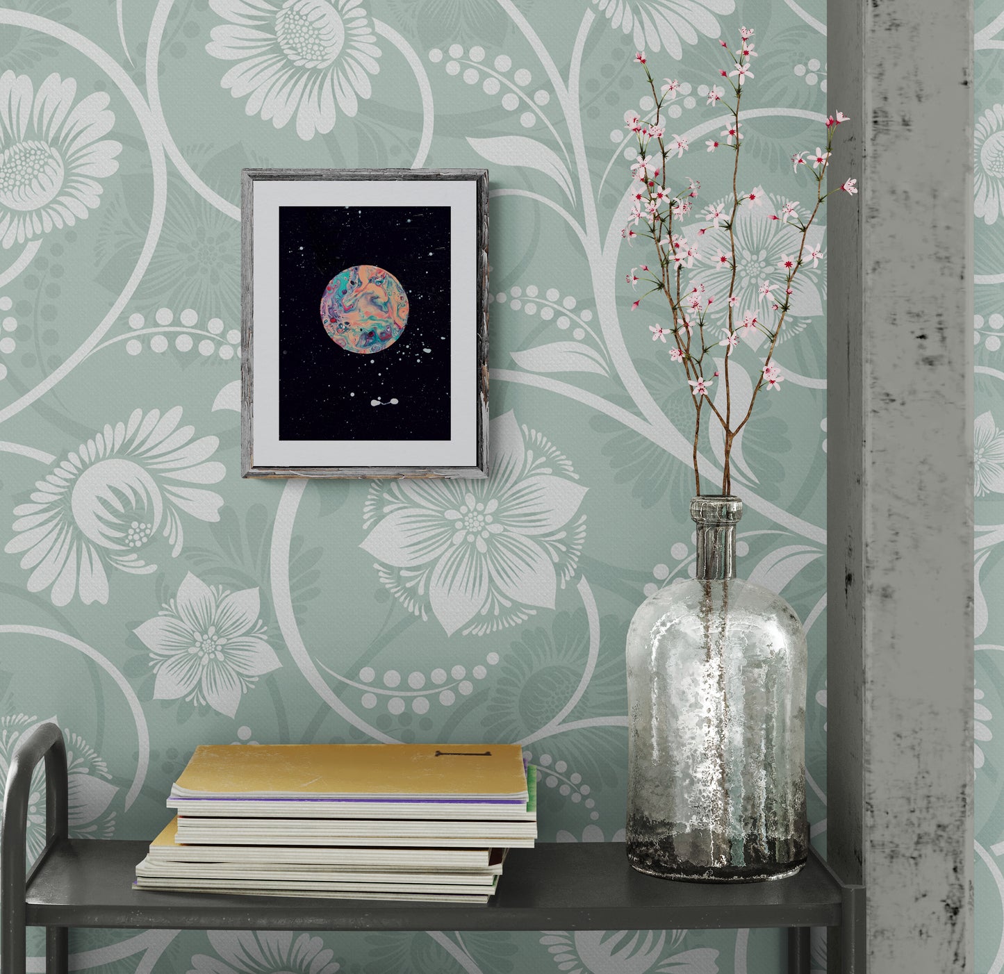 Strawberry Moon art print displayed in a birch wood frame against floral wallpaper with a vintage-style vase and stacked books