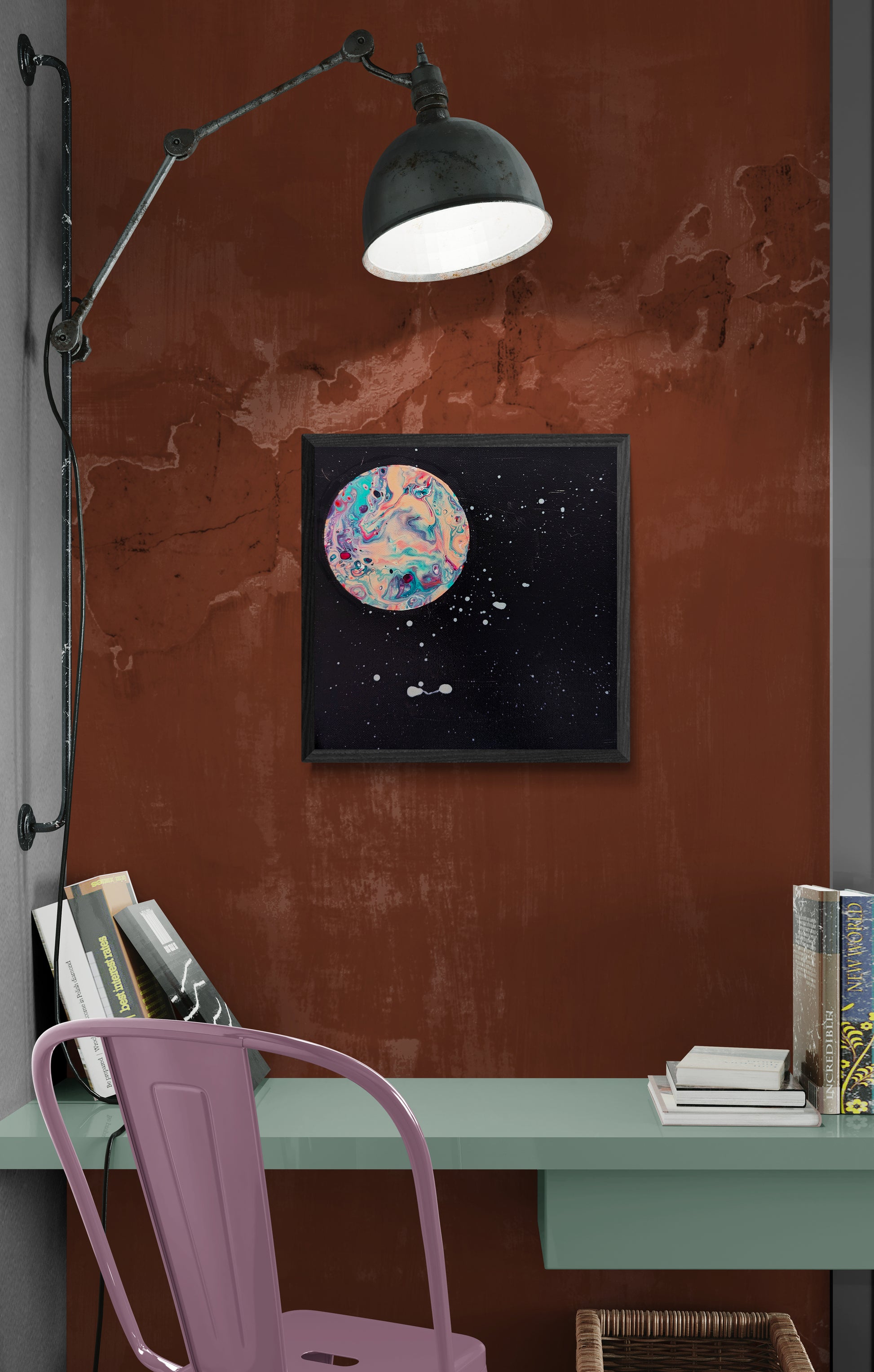 Strawberry Moon canvas displayed above a seafoam green desk with reading lamp and vintage decor on a rustic orange wall.