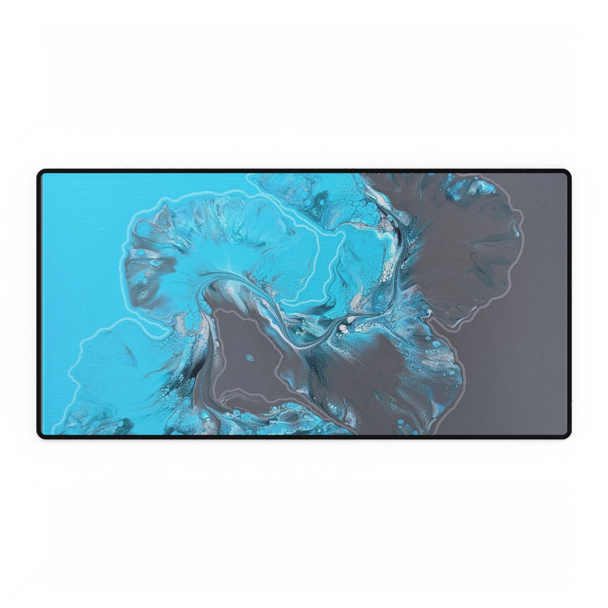 custom desk mat with acrylic fluid art on it