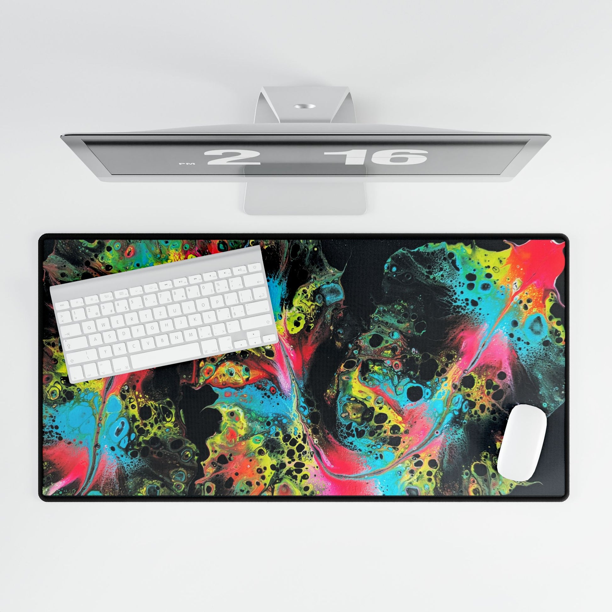 custom desk mat with acrylic fluid art on it