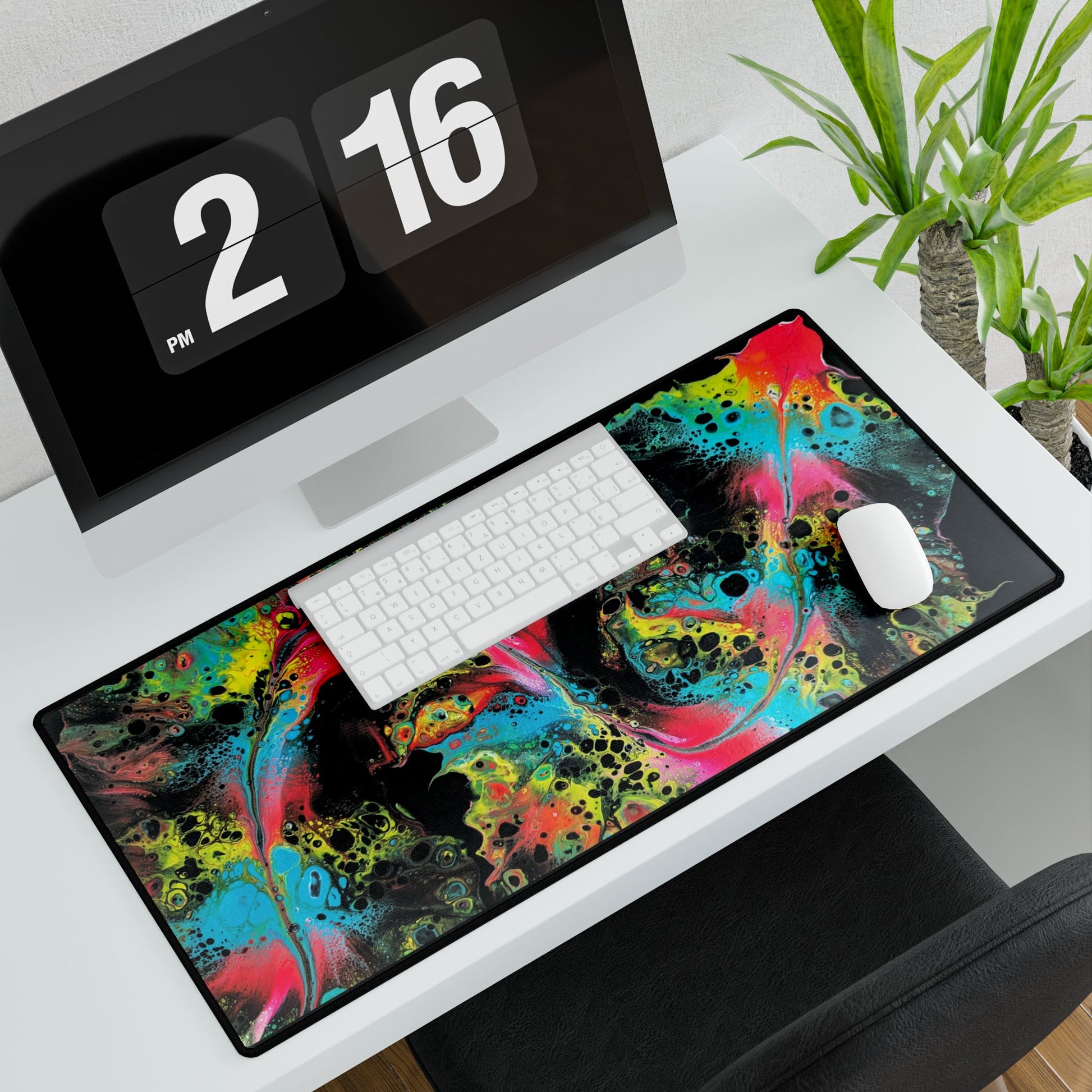 custom desk mat with acrylic fluid art on it
