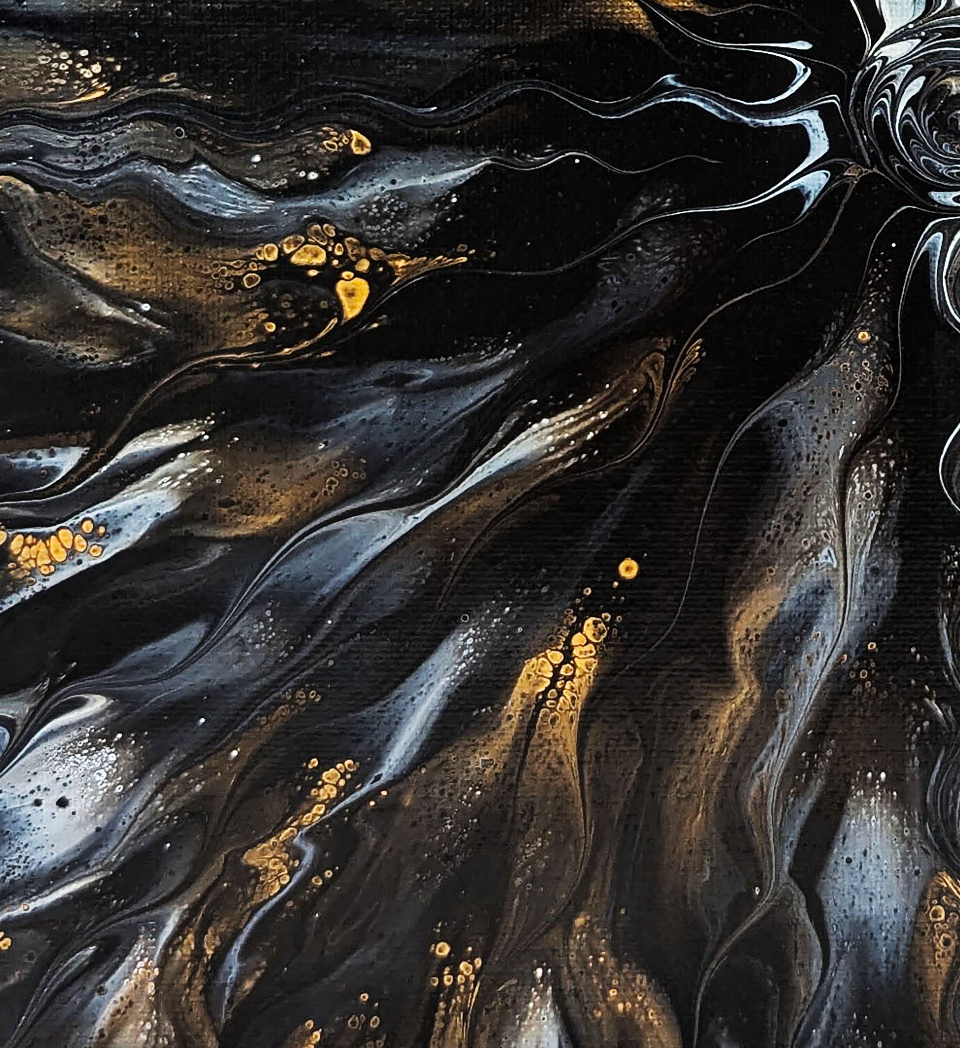 Abstract close-up of Allure, highlighting the shimmering interplay of black, gold, and soft gray waves that ripple outward from the center.