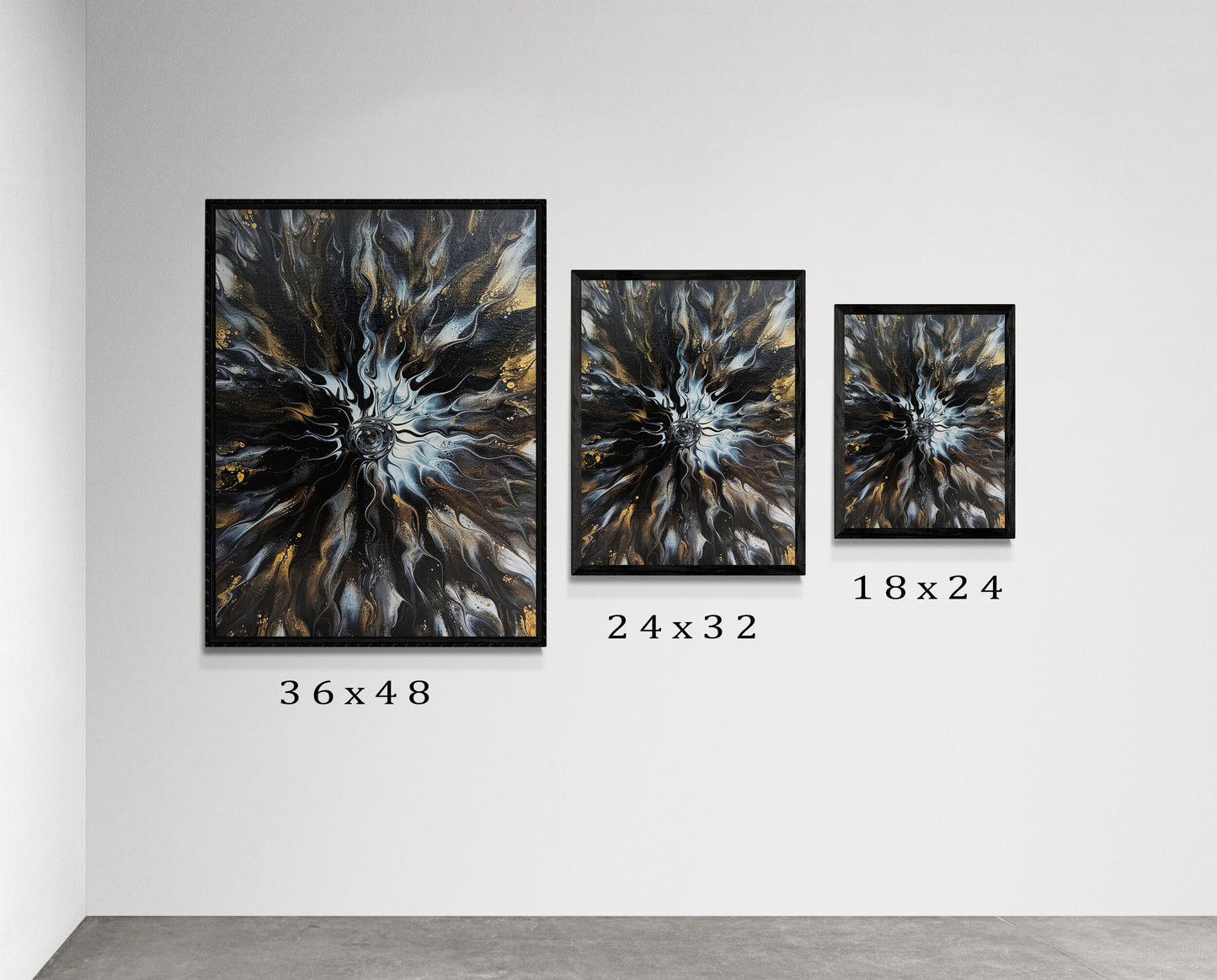 Three framed prints of Allure by Abby May displayed on a minimalist gallery wall in sizes 36x48, 24x32, and 18x24. The artwork radiates silver, black, and gold hues in a dynamic, fluid burst.