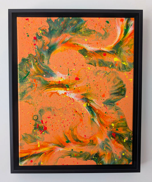 Original abstract fluid art painting titled 'Are You Really Going Out in That?' featuring bold green and dark marbled swirls over a fiery orange background, layered with vibrant splatters of yellow, red, and neon orange. Displayed in a black floating frame against a white wall.
