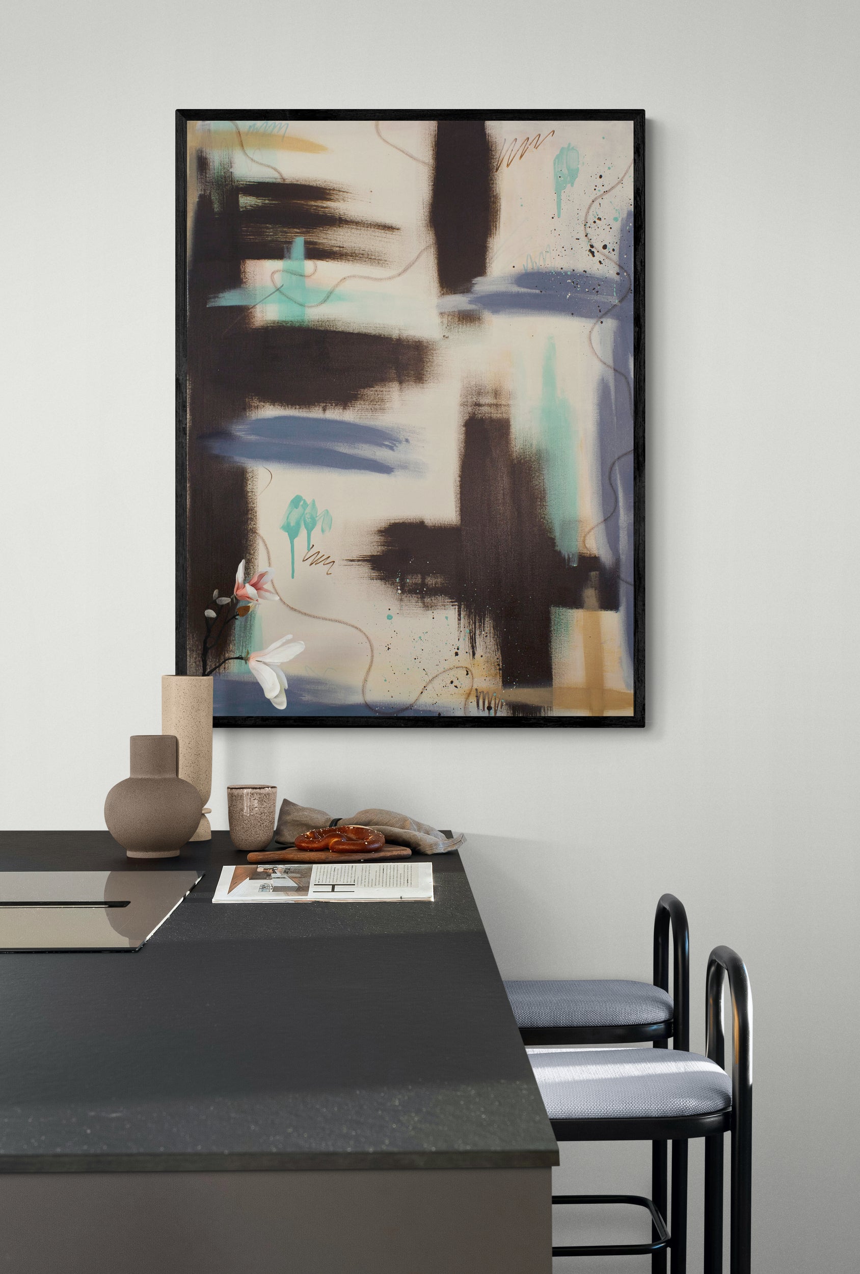 "Between the Layers" original painting styled above a contemporary dining table, highlighting the piece's grounding raw umber structures and expansive, light-filled center.
