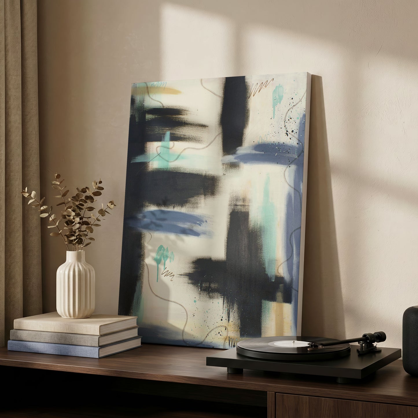 A canvas print of the painting sittong on a wooden side table, leaning against a cream colored wall. On the left are tan curtains, a white vase with plants, and on the left a simple record player.