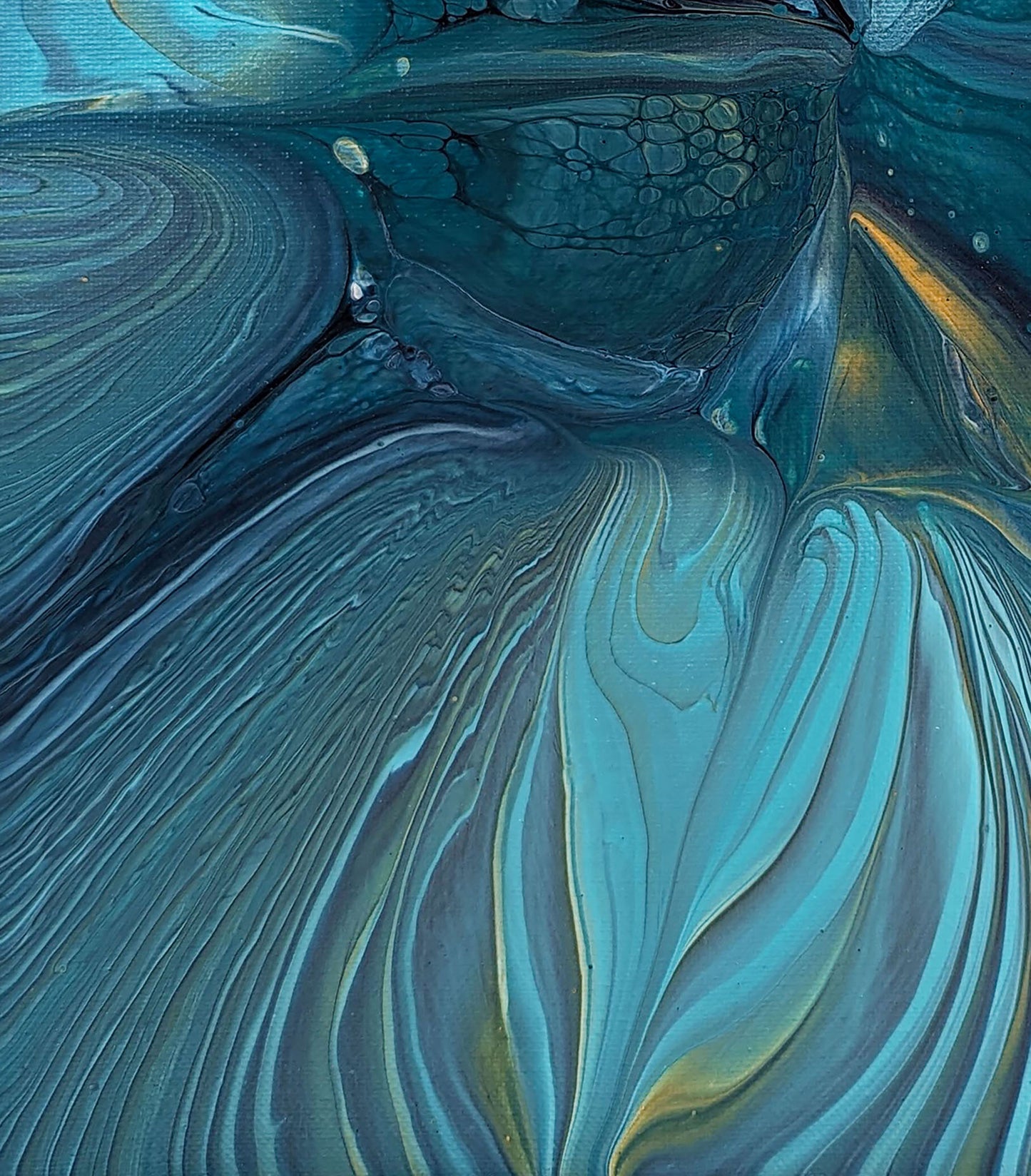 Macro detail of Blue Gem highlighting the smooth flow of turquoise and deep blue with golden accents rippling like light through water.