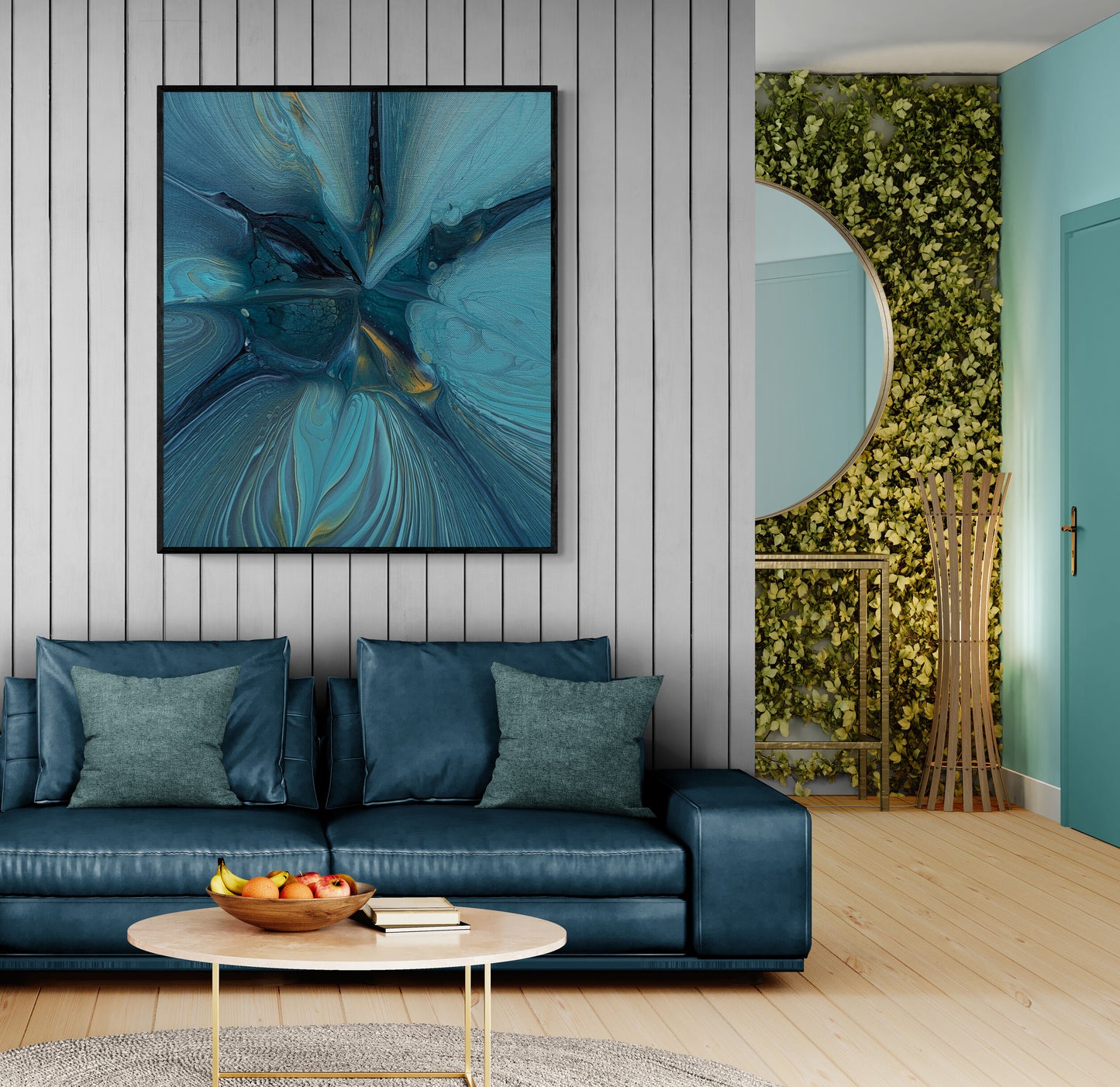 Framed Blue Gem by Abby May displayed above a navy sofa with gray paneling and greenery. The teal and gold abstract tones add calm elegance