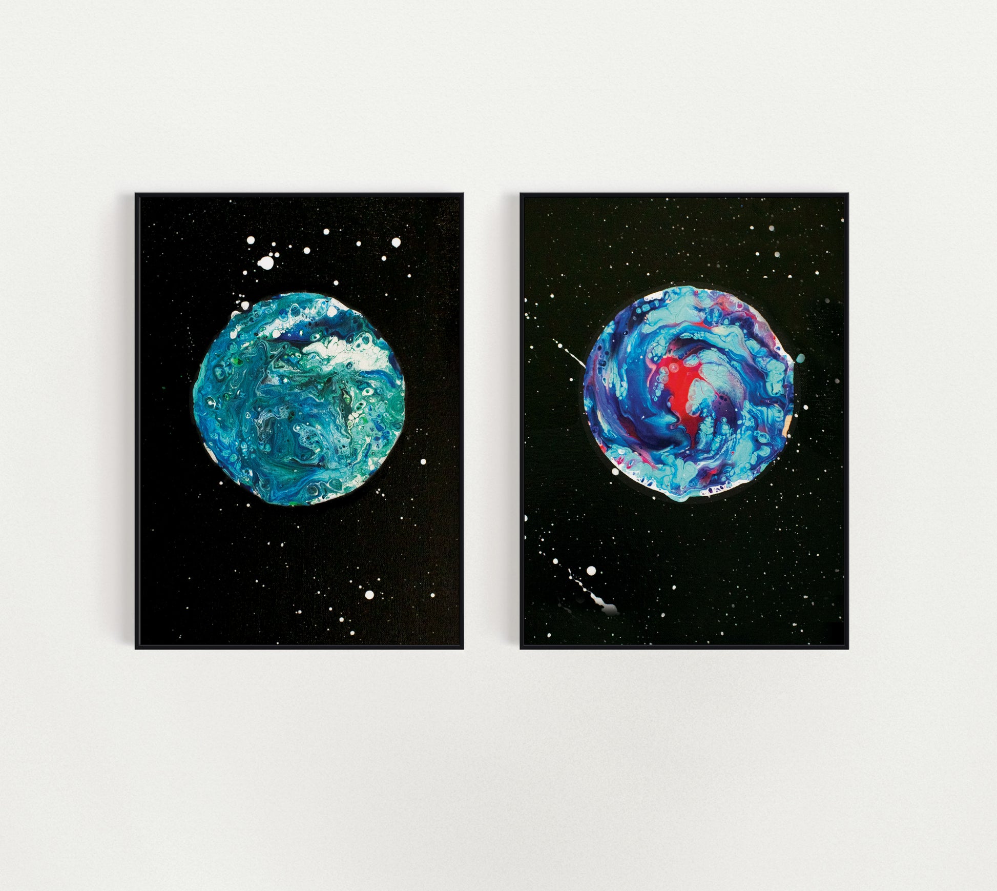 Blue Moon and Her Majesty The Moon acrylic fluid art prints side by side on a clean white wall, shown unframed to highlight their vibrant abstract celestial designs.