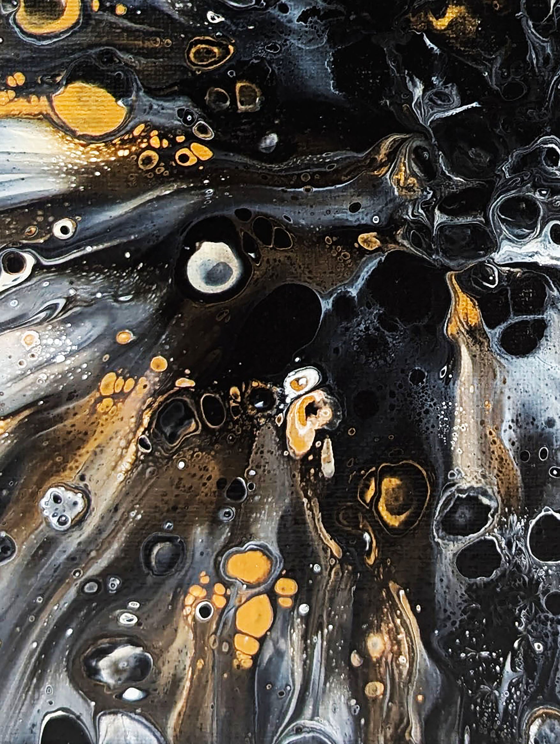 Detail view of Charm by Abby May highlighting fluid metallic gold and silver cells within deep black layers, creating a sense of glowing movement.