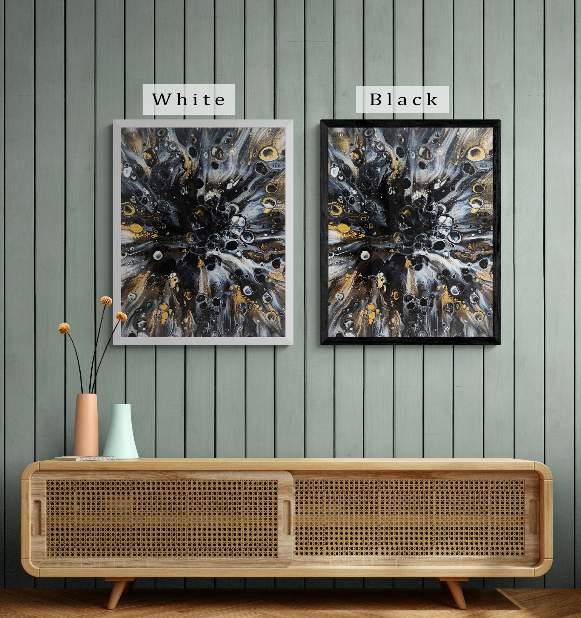 Side-by-side framed Charm prints by Abby May shown in white and black frames. The fluid gold and black swirls shimmer against a soft green-paneled wall