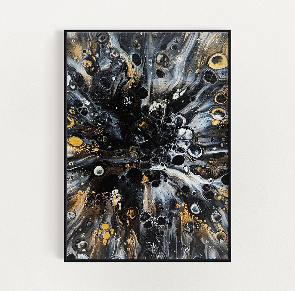 Framed view of Charm by Abby May — an abstract fluid art painting with swirling black, gold, and silver tones that form a luminous, cell-like pattern radiating from the center. A bold yet elegant composition that captures movement and depth.
