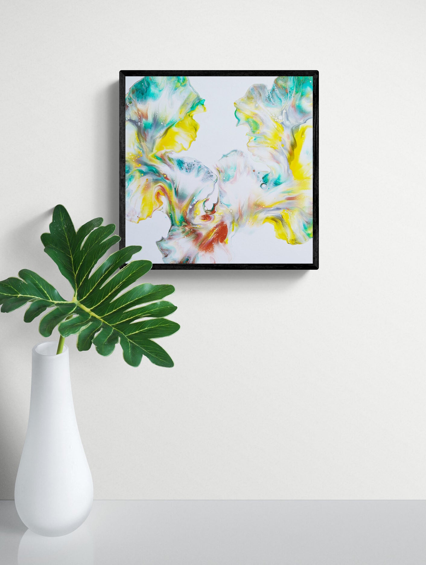 First Daffodils of Spring – vibrant yellow and green abstract fluid art print, framed wall art displayed with a modern white vase and leaf.