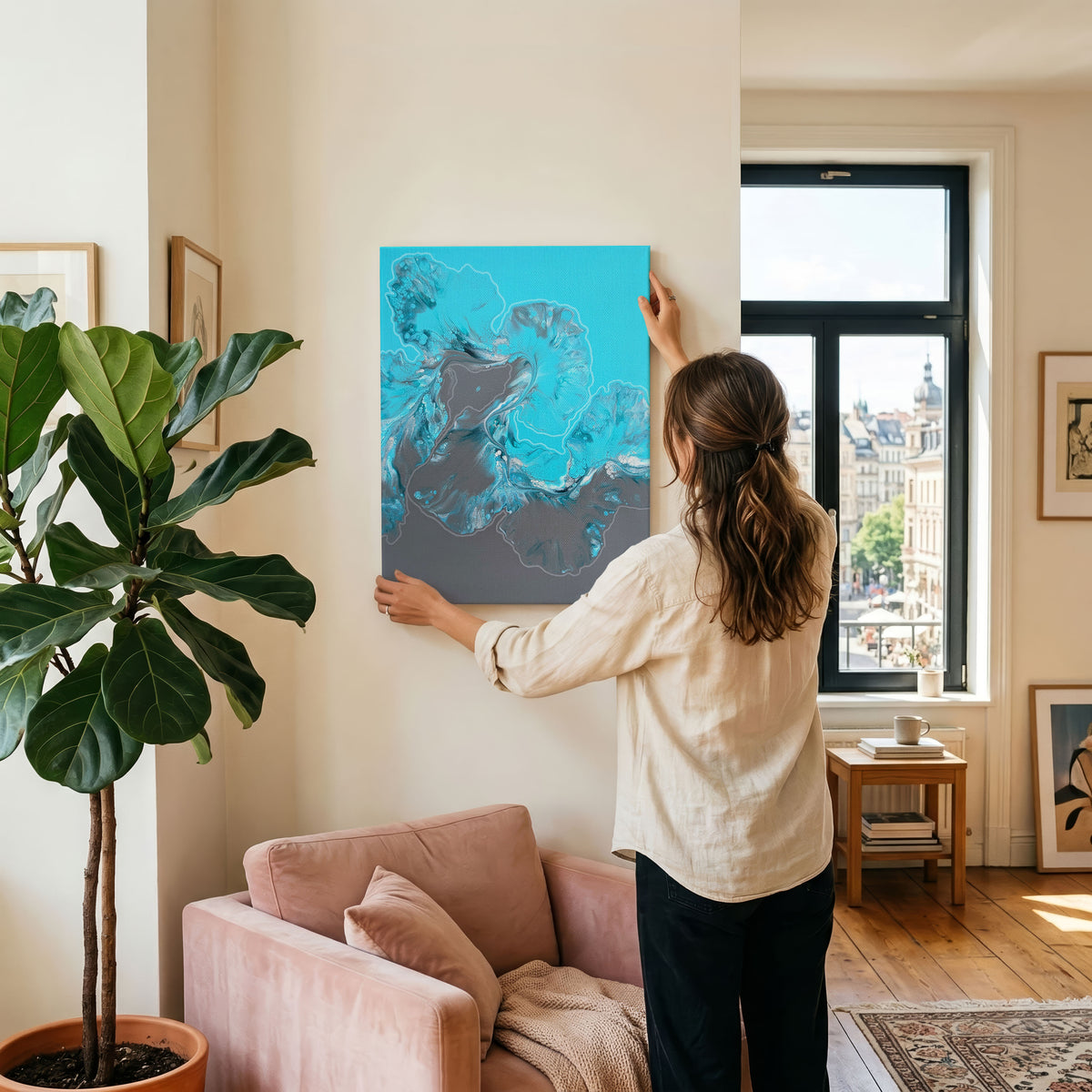 Glacier, an original fluid painting by Abby May, turquoise and grey with cells, shown straight on in a room on a wall.