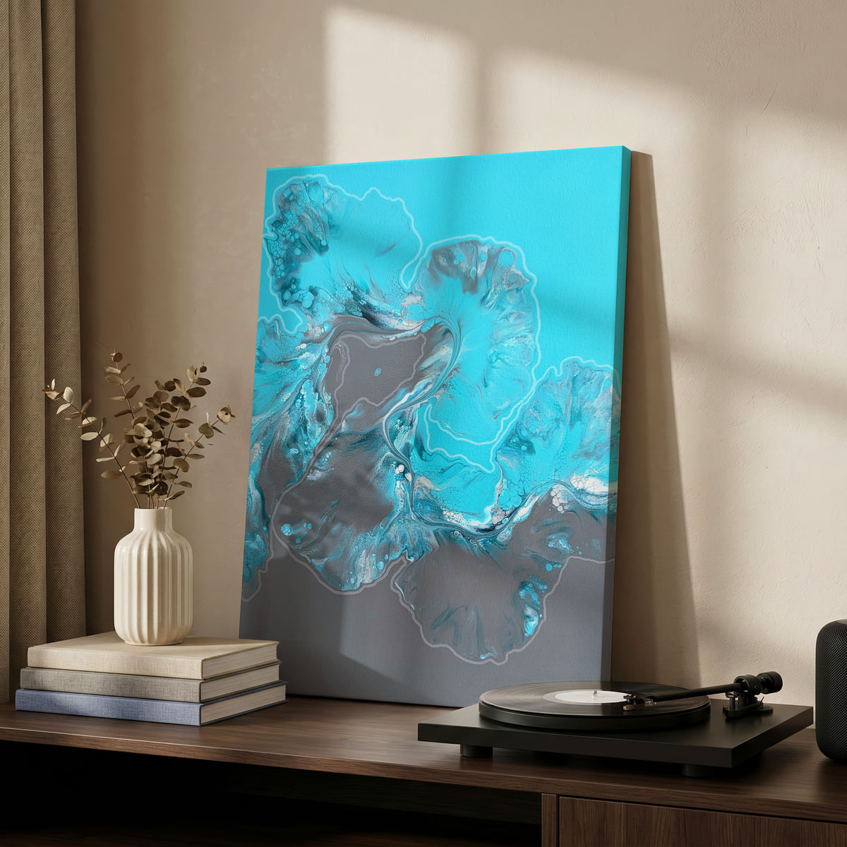 Angle view of Glacier, an original fluid painting by Abby May, shown in a room on a wood shelf beside a record player, with the canvas edge visible.