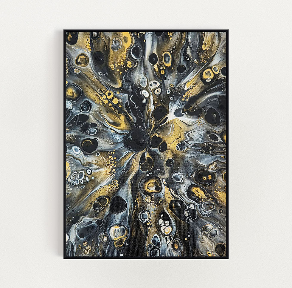 Close-up view of Abby May’s abstract fluid art piece Glamorous, featuring swirling patterns of gold, black, gray, and white that create a sense of movement and depth, framed in black against a white background