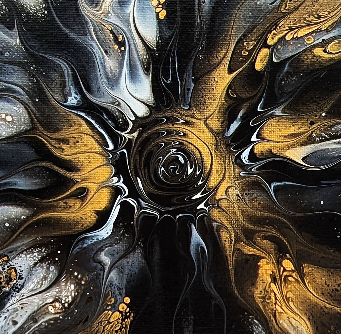 Close-up of Abby May’s abstract painting Glitz, showing the swirling black and gold center that creates a sense of depth and motion with glossy, fluid textures.