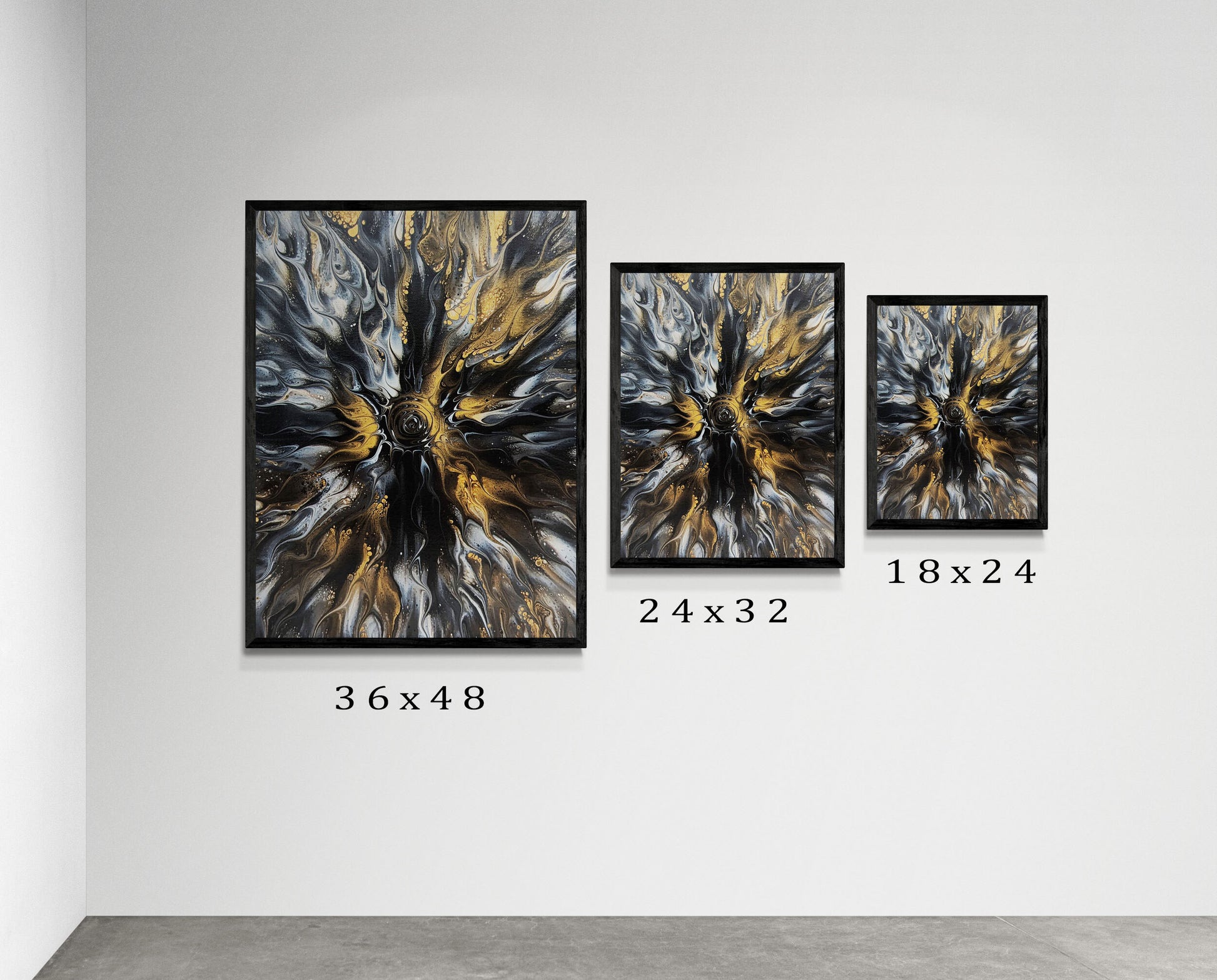 Three framed prints of Abby May’s Glitz painting displayed on a gallery wall, showing available sizes 36x48, 24x32, and 18x24. The abstract features gold, black, and gray fluid swirls with dynamic contrast.