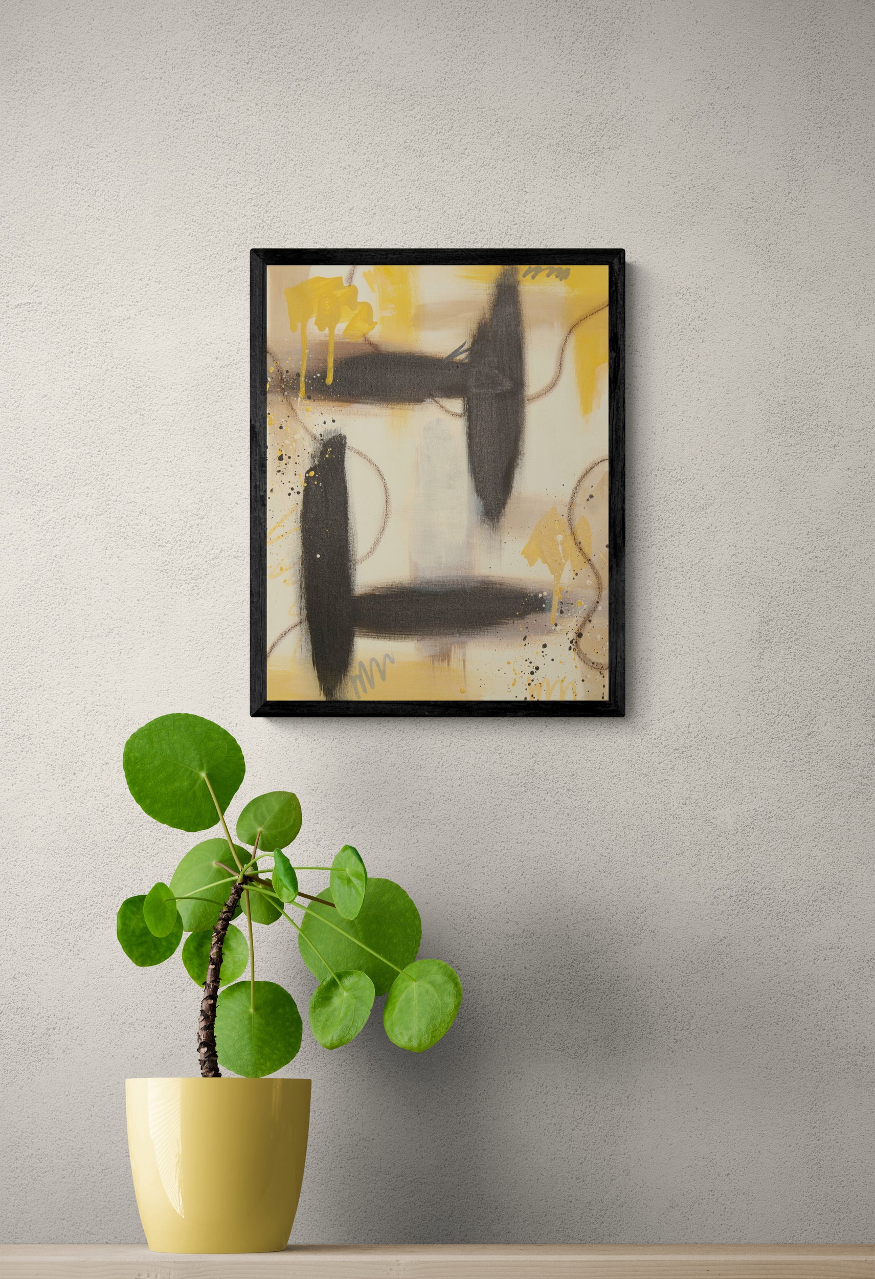 Abstract art "Golden Kindling" by Abby May styled in a bright room with a plant, showing how the warm, golden palette brings life to a contemporary space.
