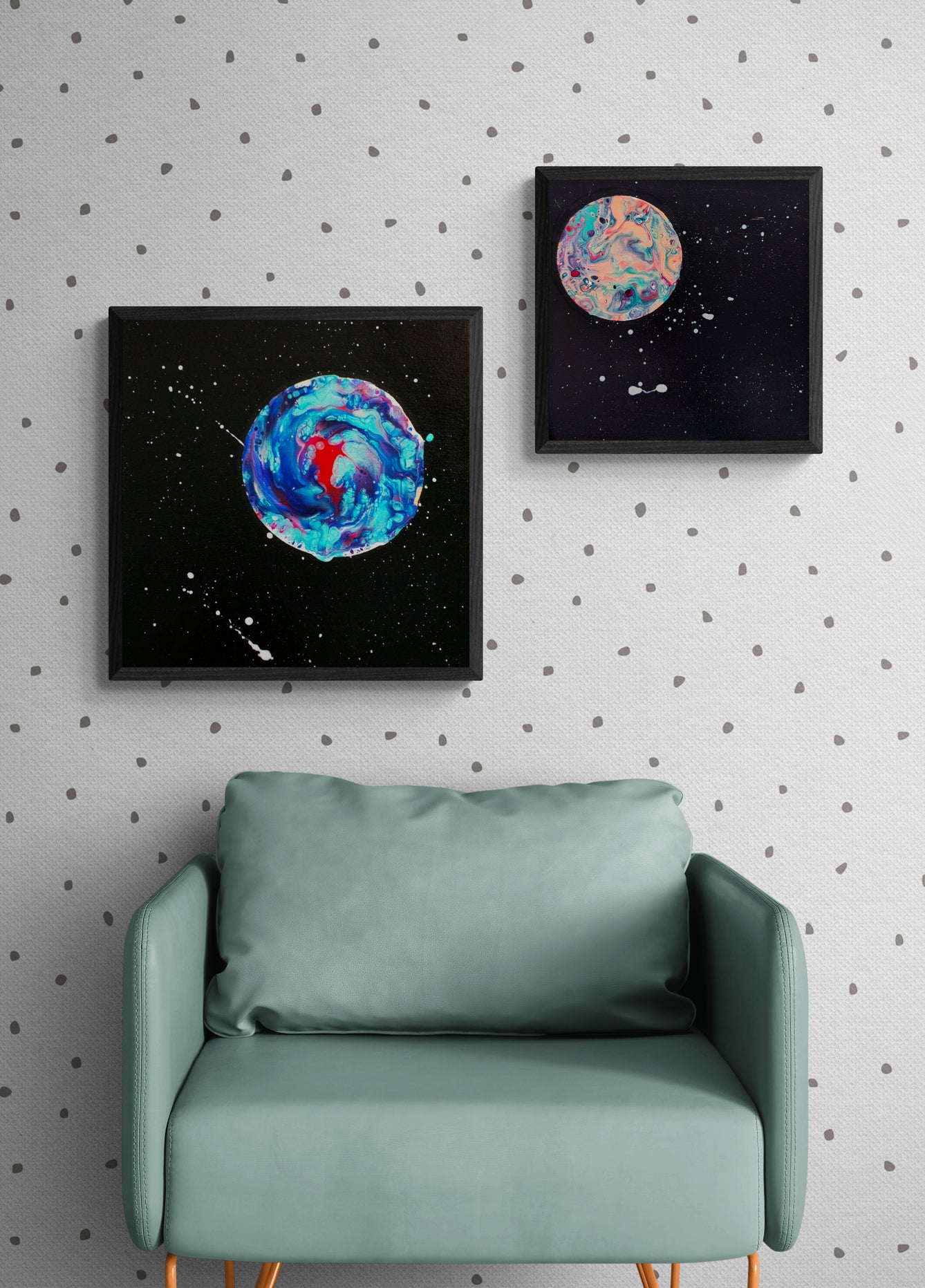Her Majesty the Moon and Strawberry Moon framed side-by-side above a mint green couch with polka-dot wallpaper.