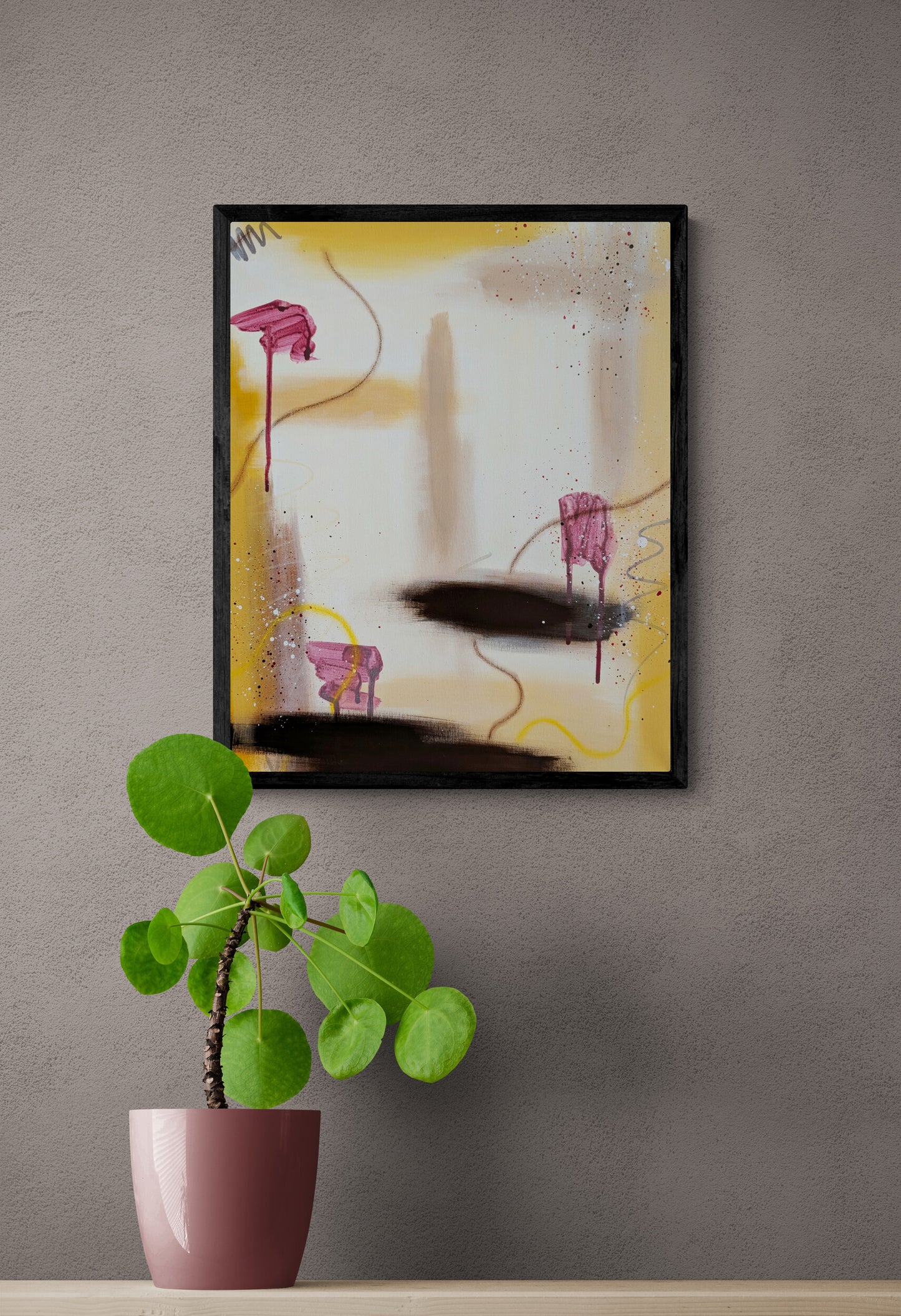 "Marigold" original painting by Abby May styled in a bright interior next to an indoor plant, highlighting the organic movement and radiant, warm energy of the piece.