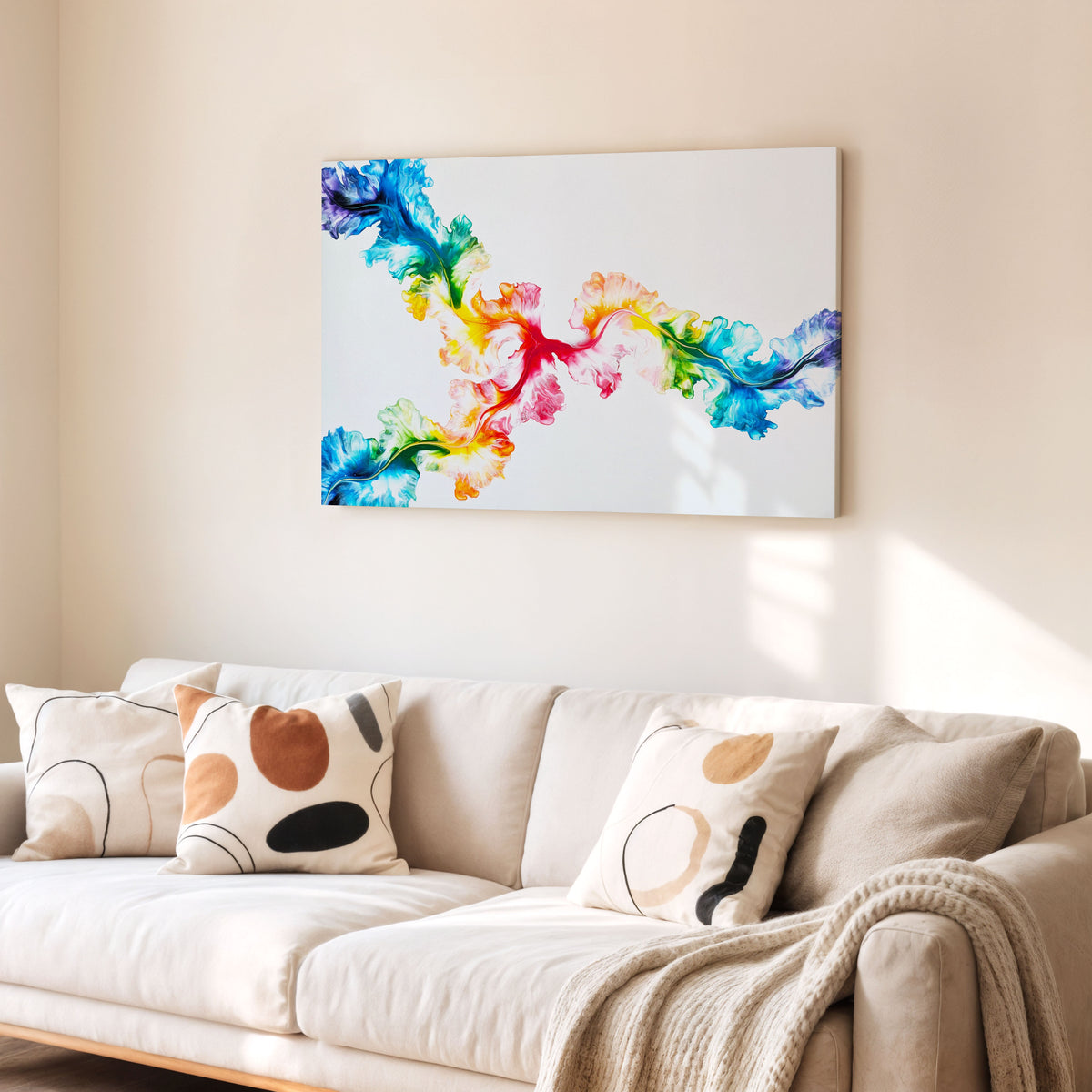 Never Dim Your Light, an original fluid painting by Abby May, a rainbow dutch pour with a red center, shown straight on in a room above a couch.