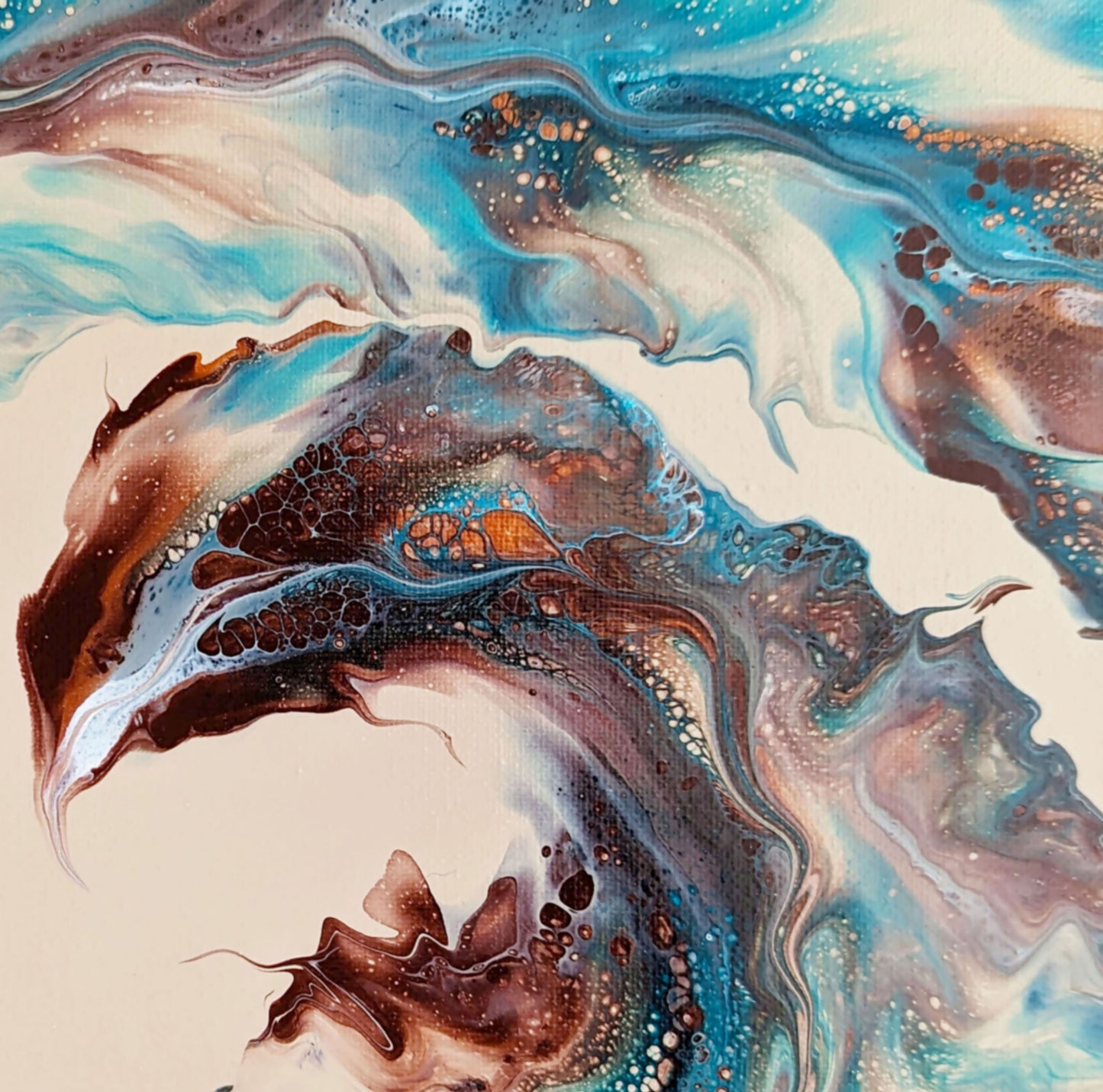 Detail view of Phoenix acrylic pour artwork, highlighting bold copper tones against flowing aqua and ivory.