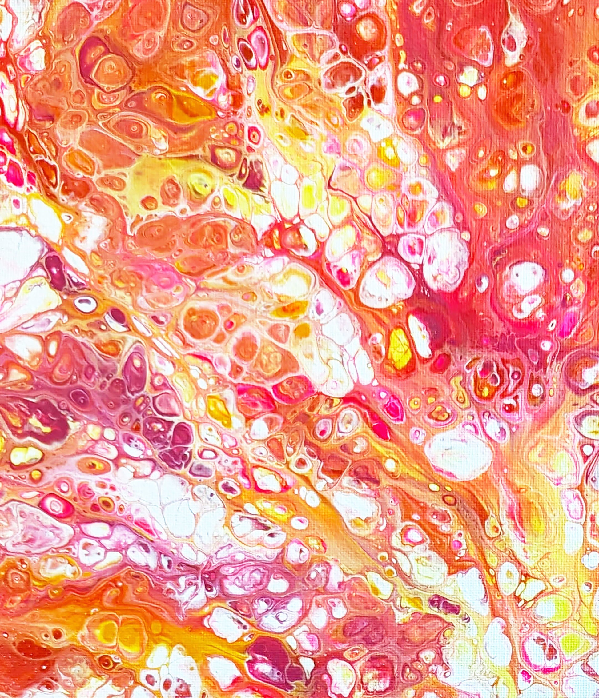 Macro detail of “Phoenix Aflame” acrylic pour art with bright orange, magenta, and golden tones layered in a glowing cellular pattern.