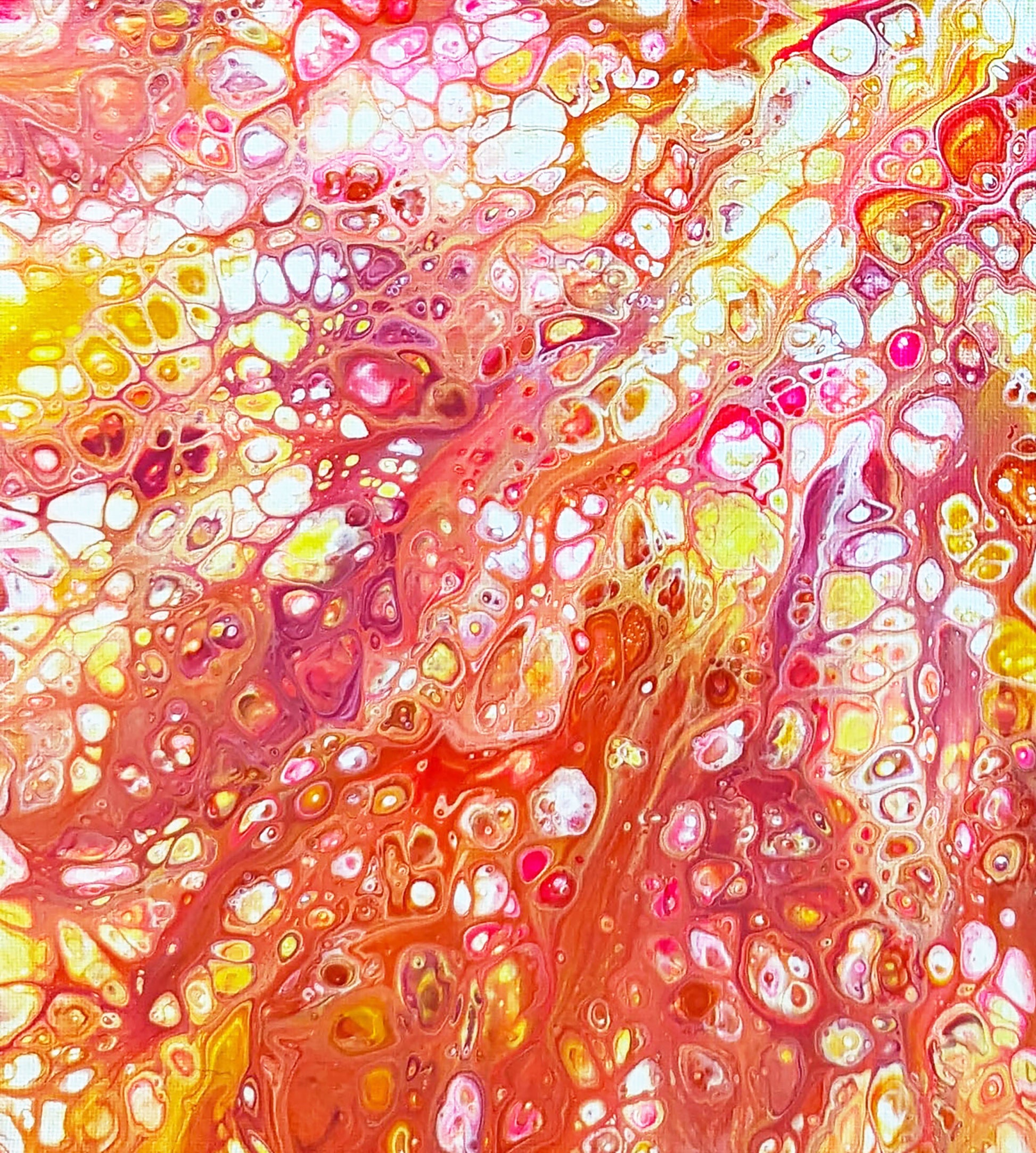 Close-up of “Phoenix Aflame” print highlighting intricate red, yellow, and pink paint cells blending together in a fiery abstract texture.