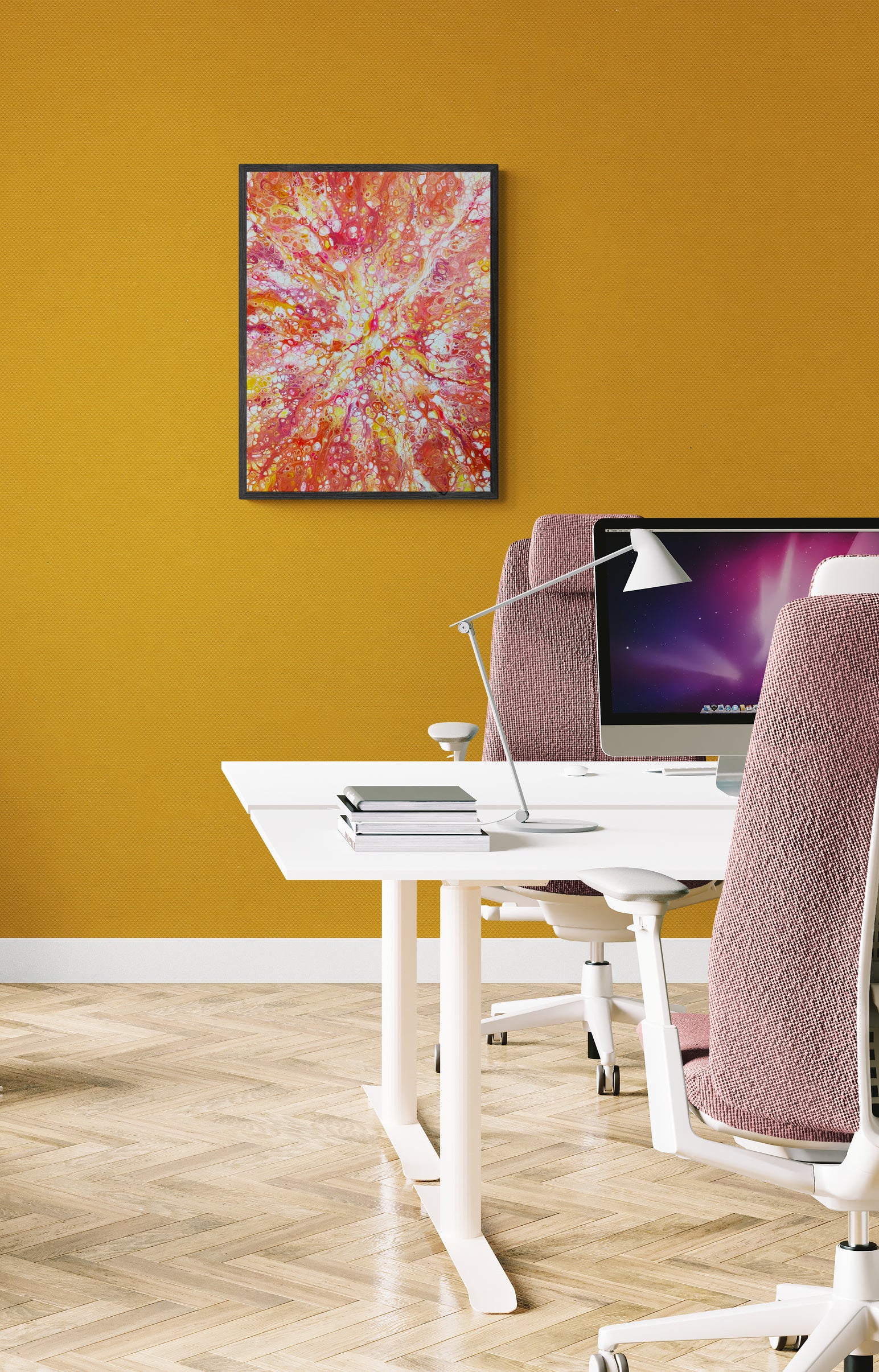 Phoenix Aflame fluid art painting framed in black, styled in a modern office with mustard yellow walls, a white desk, and muted pink chairs.