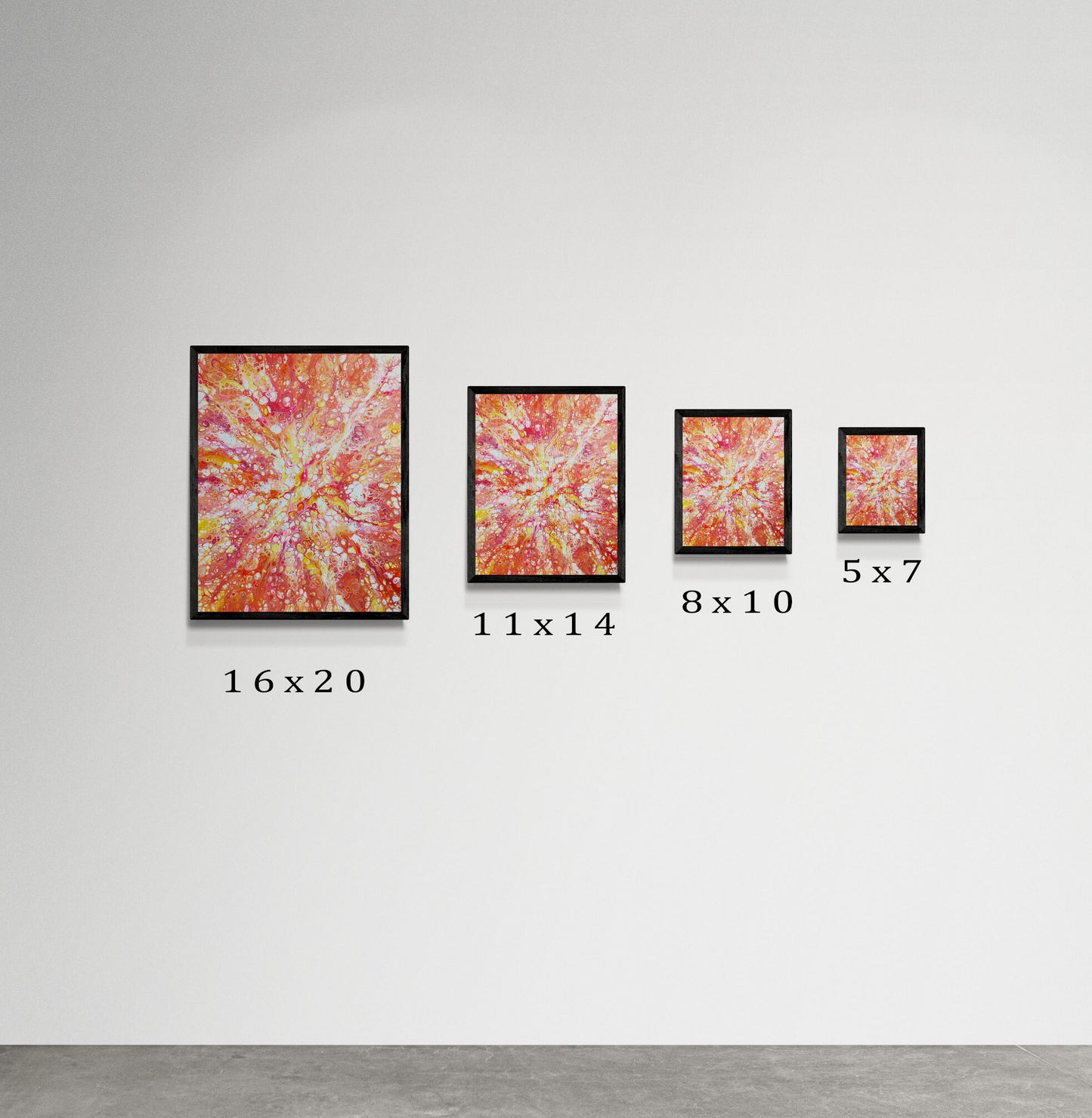 Gallery-style wall showing the Phoenix Aflame artwork in four sizes—16x20, 11x14, 8x10, and 5x7—with black frames, arranged largest to smallest.