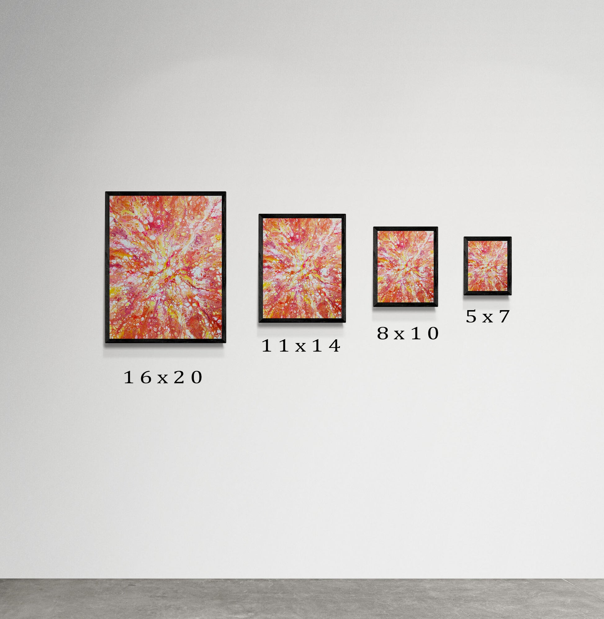 Gallery-style wall showing the Phoenix Aflame artwork in four sizes—16x20, 11x14, 8x10, and 5x7—with black frames, arranged largest to smallest.