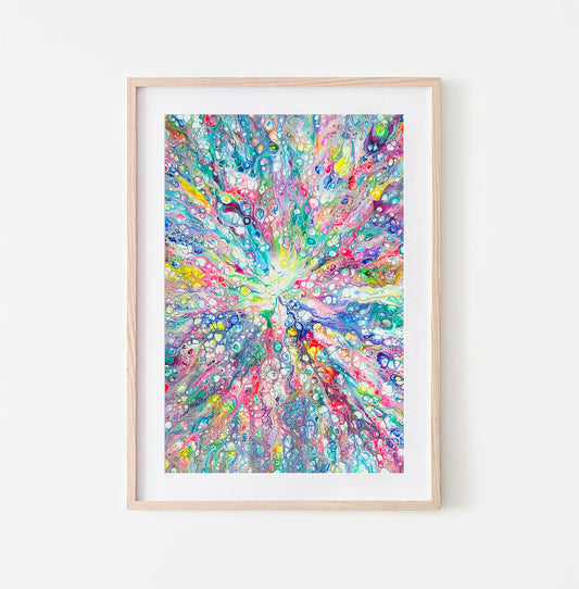 Rainbow Dragon abstract fluid art print with radiant rainbow colors and cell details, framed in light wood and styled on a white wall.